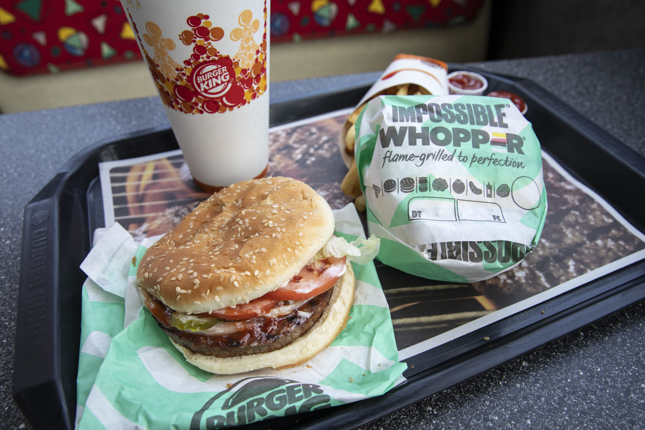 NEW YORK, NY - AUGUST 8: In this photo illustration, the new Impossible Whopper sits on a table at a Burger King restaurant on August 8, 2019 in the Brooklyn borough of New York City. (Photo by Drew Angerer/Getty Images)