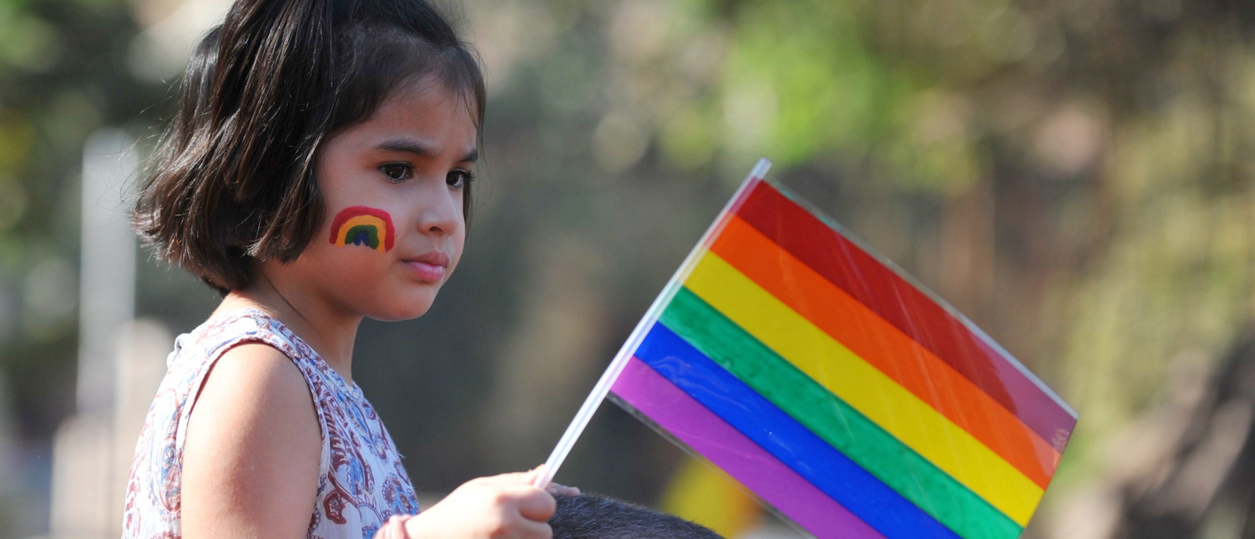 A girl looks on during the "Queer Azadi March" freedom march for lesbian, gay, bisexual and transgender supporters, in Mumbai on January 29, 2011. (Photo by SAJJAD HUSSAIN/AFP via Getty Images)