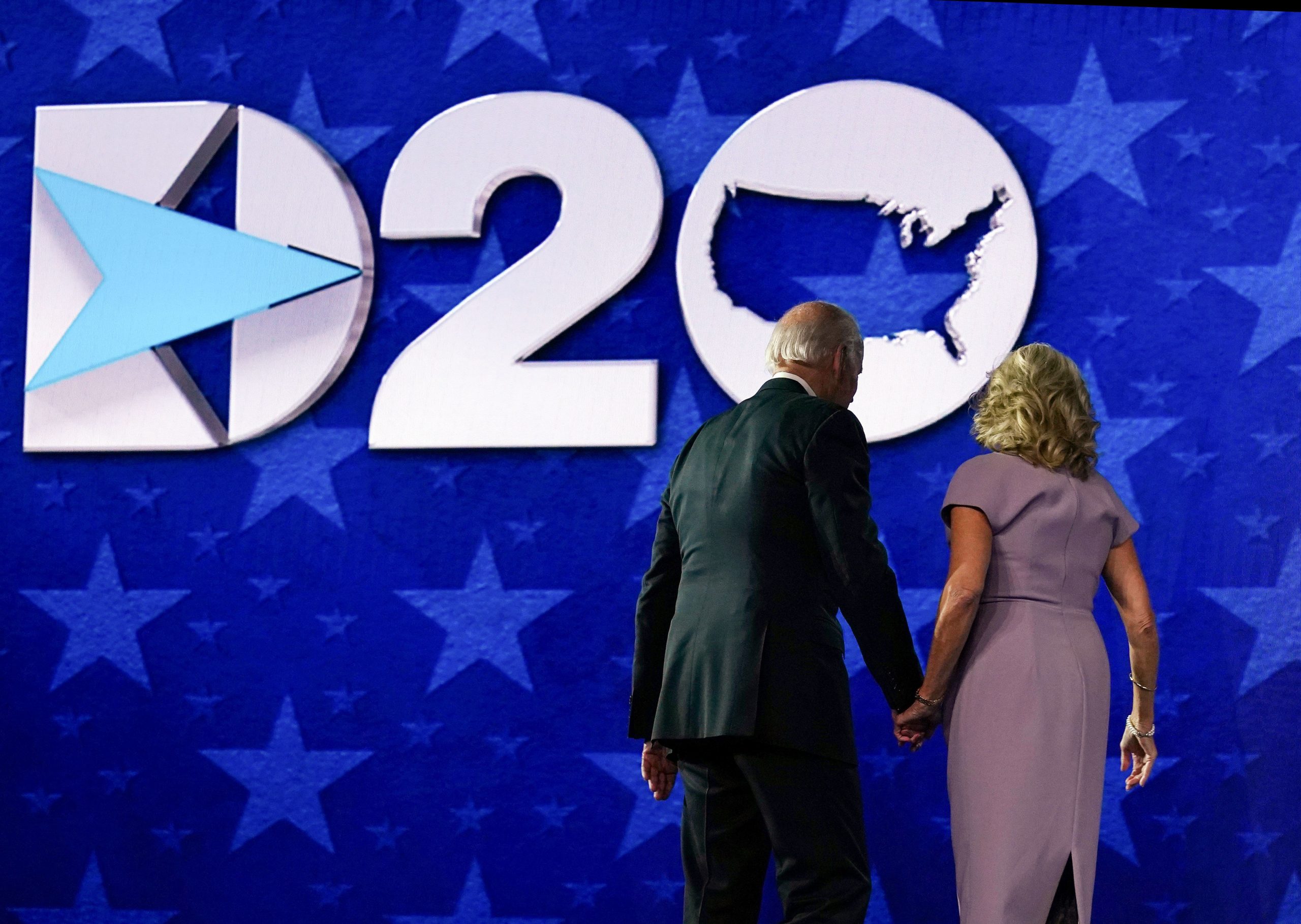 Former vice-president and Democratic presidential nominee Joe Biden and his wife Jill Biden stand on stage after he accepted the Democratic Party nomination for US president during the last day of the Democratic National Convention, being held virtually amid the novel coronavirus pandemic, at the Chase Center in Wilmington, Delaware on August 20, 2020. (Photo by Olivier DOULIERY / AFP) (Photo by OLIVIER DOULIERY/AFP via Getty Images)