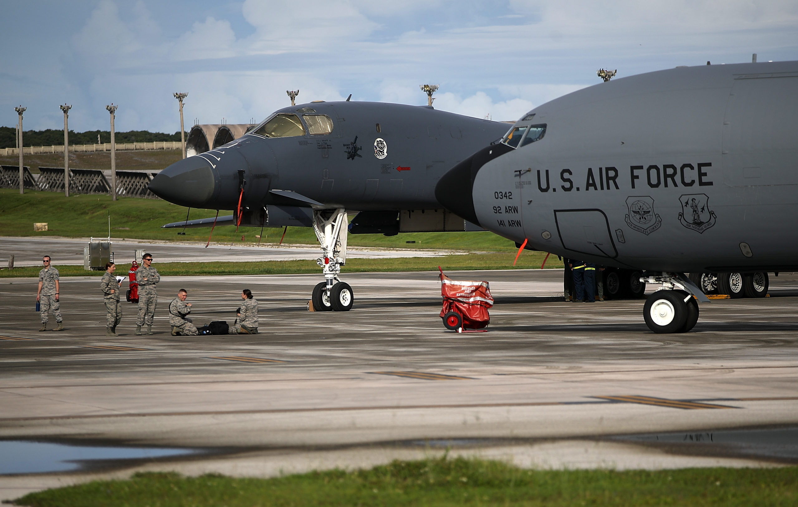 YIGO, GUAM - AUGUST 17: A U.S. Air Force Rockwell B-1B Lancer (L) and a Boeing KC-135 Stratotanker (R) sit on the tarmac at Andersen Air Force base on August 17, 2017 in Yigo, Guam. The American territory of Guam remains on high alert as a showdown between the U.S. and North Korea continues. North Korea has said that it is planning to launch four missiles near Guam by the middle of August. Guam home to about 7,000 American troops and 160,000 residents. (Photo by Justin Sullivan/Getty Images)