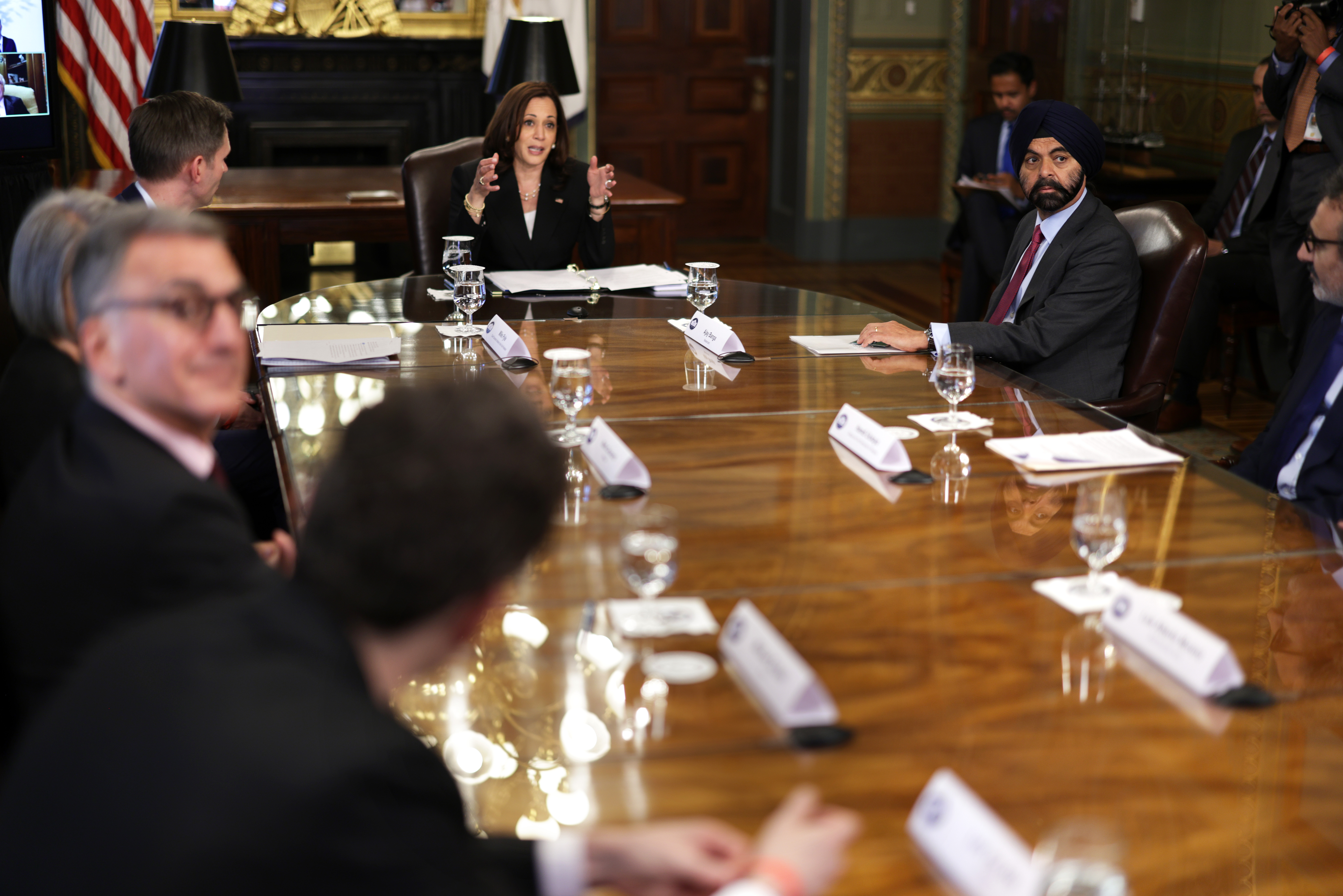 WASHINGTON, DC - MAY 27: U.S. Vice President Kamala Harris delivers opening remarks during a meeting with top business leaders, including Executive Chairman of Mastercard Ajay Banga (R) on the Northern Triangle in Central America, at the Vice President’s Ceremony Office at Eisenhower Executive Office Building May 27, 2021 in Washington, DC. Vice President Harris held a meeting with CEOs of the 12 companies and organizations that had announced commitments to support “inclusive economic development in the Northern Triangle” to discuss “strategy to address the root causes of migration by promoting economic opportunity.” (Photo by Alex Wong/Getty Images)