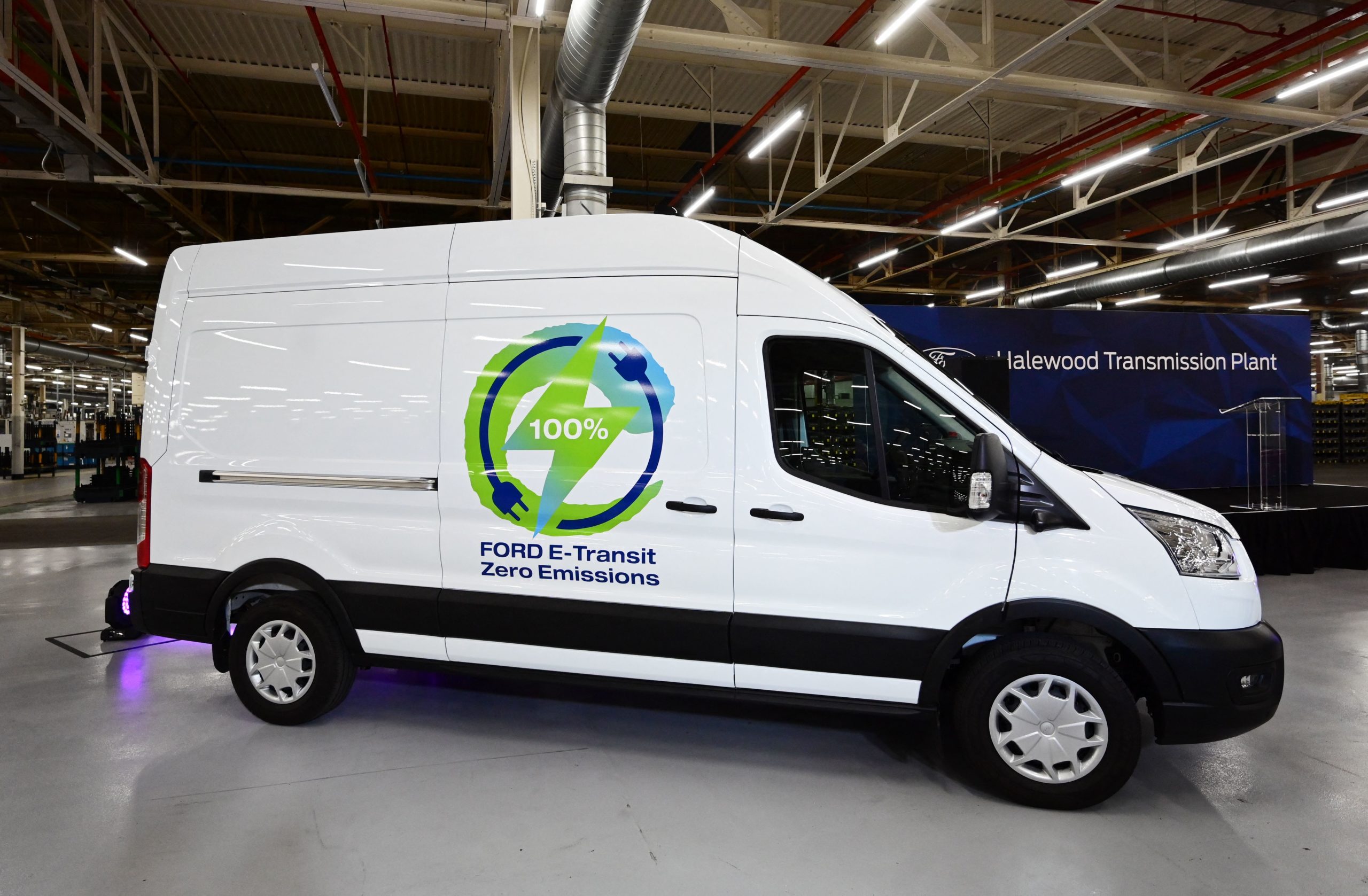 A Ford E-Transit van is seen on display at the Ford Halewood plant in Liverpool, north west England on October 18, 2021. - US auto giant Ford on October 18 unveiled plans to convert a UK factory into its first electric vehicle component assembly site in Europe. Ford will invest £230 million ($316 million, 273 million euros) in its Halewood plant on Merseyside in northwest England, the carmaker said. (Photo by PAUL ELLIS/AFP via Getty Images)