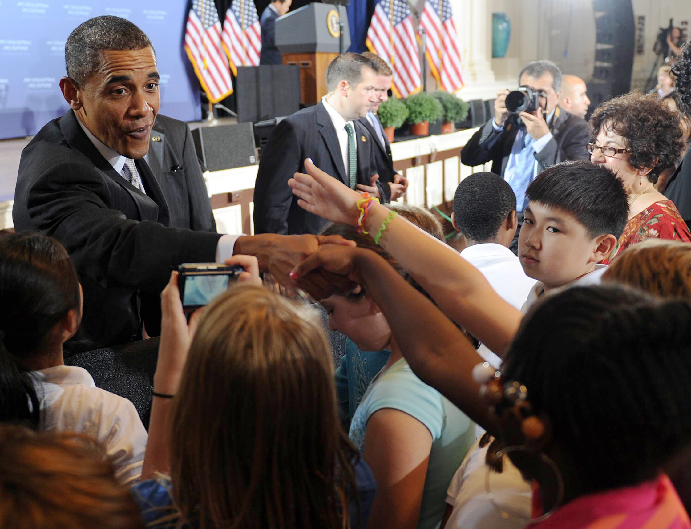 US President Barack Obama shakes hands with students after his second annual Back-to-School speech on September 14, 2010 at the Julia R. Masterman Laboratory and Demonstration School in Philadelphia, Pennsylvania. AFP PHOTO / TIM SLOAN (Photo credit should read TIM SLOAN/AFP via Getty Images)
