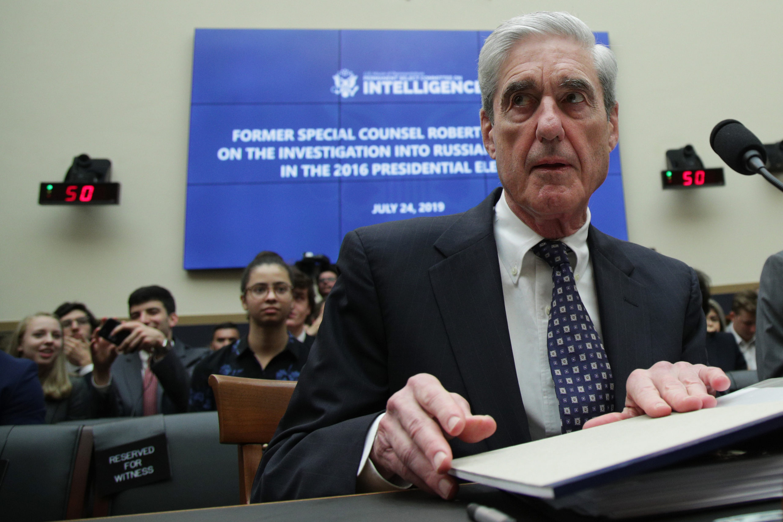 WASHINGTON, DC - JULY 24: Former Special Counsel Robert Mueller waits to testify before the House Intelligence Committee about his report on Russian interference in the 2016 presidential election in the Rayburn House Office Building July 24, 2019 in Washington, DC. Mueller testified earlier in the day before the House Judiciary Committee in back-to-back hearings on Capitol Hill. (Photo by Alex Wong/Getty Images)