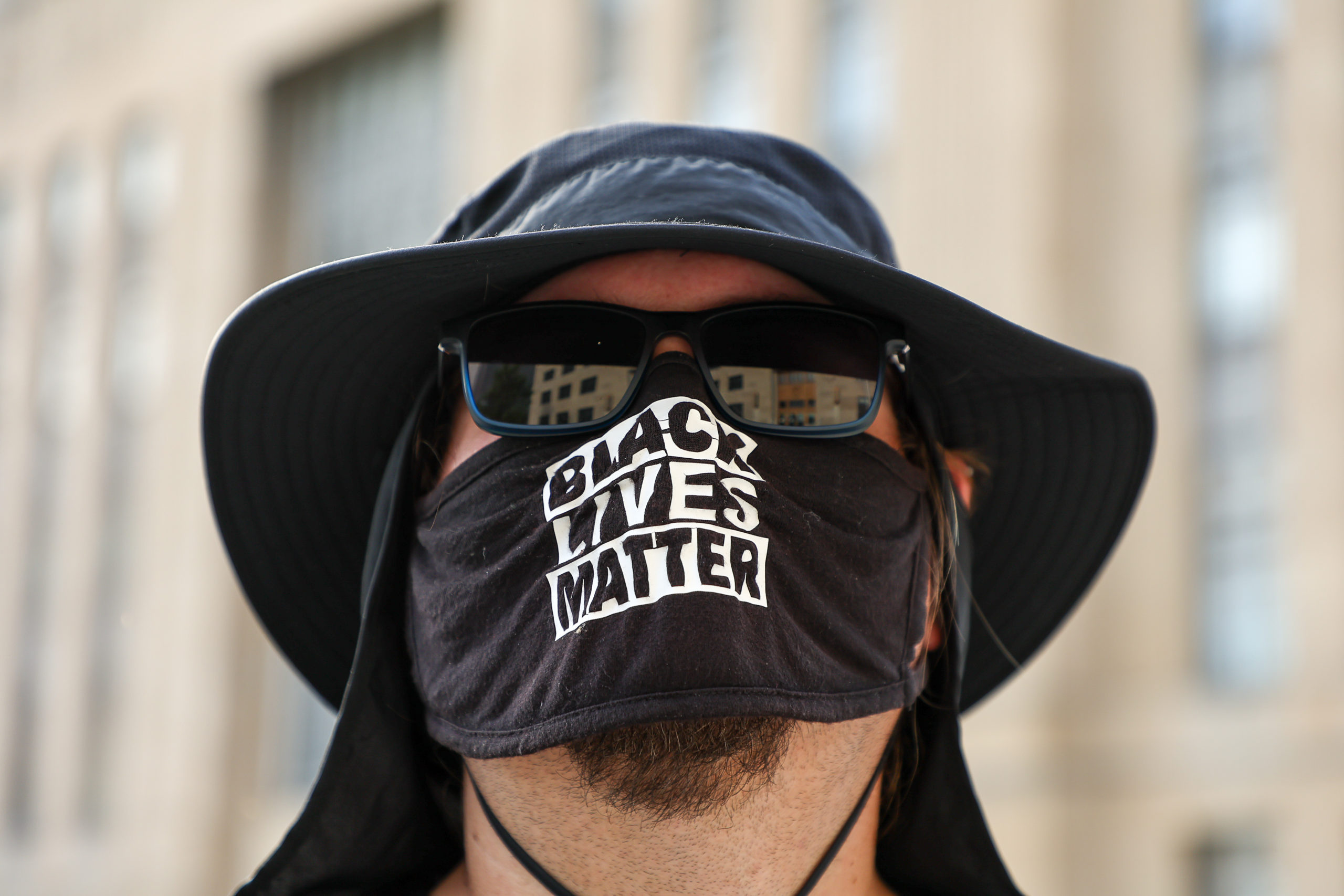 Black Lives Matter face mask seen during a protest in rememberance of Black lives lost at the hands of Kansas City police on June 10, 2022 in Kansas City, Missouri. (Photo by Arturo Holmes/Getty Images for National Urban League)