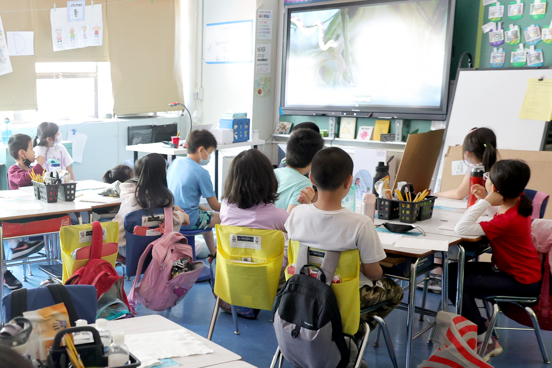 Students attend class on the second to last day of school as New York City public schools prepare to wrap up the year at Yung Wing School P.S. 124 on June 24, 2022 in New York City. Approximately 75% of NYC public schools enrolled fewer students for the 2021/2022 school year due to the pandemic. (Photo by Michael Loccisano/Getty Images)