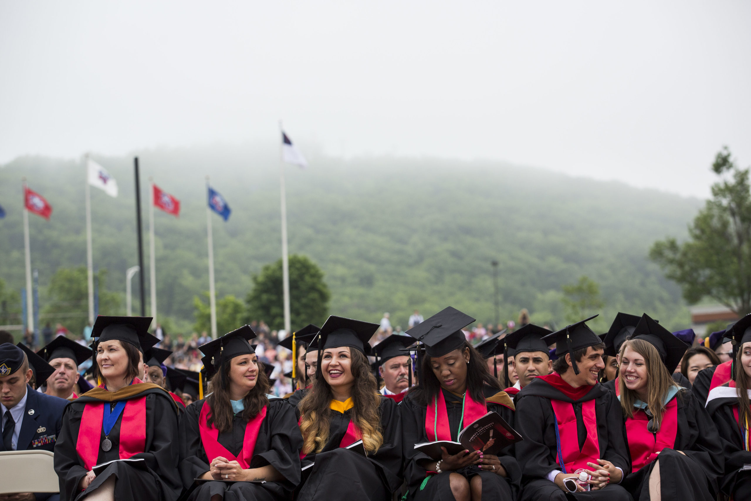 Graduates wait for the start of the commencement ceremony at Williams Stadium, where Republican U.S. presidential hopeful and former Florida governor Jeb Bush delivered the commencement address, on the campus of Liberty University, May 9, 2015 in Lynchburg, Virginia. 