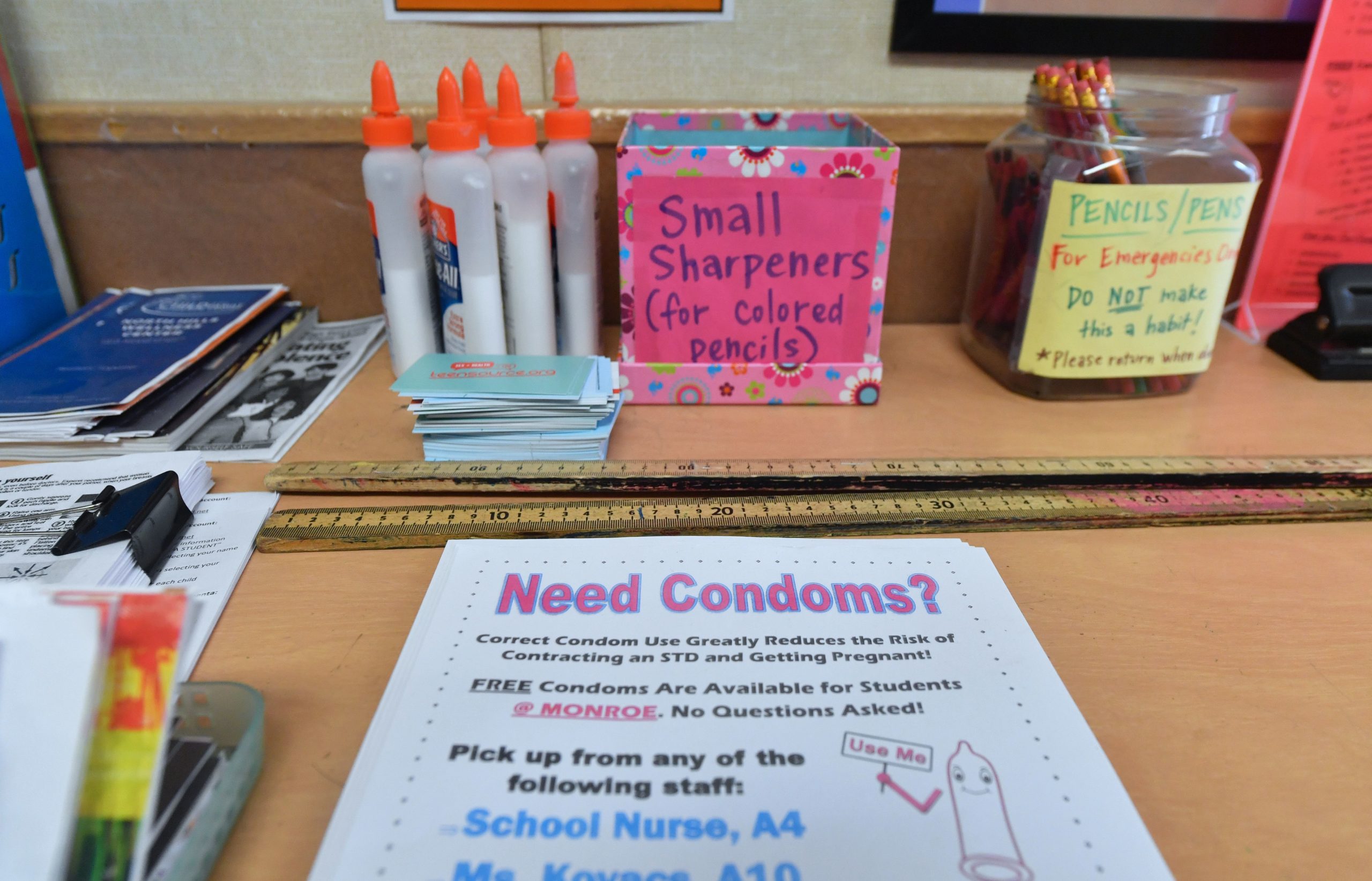 A flyer reminds students of the availability of condoms as well as their confidentiality in the classroom of Health Education teacher Leticia Jenkins at James Monroe High School in North Hills, California on May 18, 2018. - A billboard on Sunset Boulevard in Hollywood screams out a stark warning: "drug-resistant gonorrhea alert!" Sexually transmitted diseases have made an alarming resurgence across the US, where 2016 saw a record two million cases of chlamydia, gonorrhea and syphilis, including 628 cases of congenital syphilis. But California, the most populous US state, stands out for its willingness to tackle the crisis head-on, with cases of the three ailments up 45 percent in 2017 from five years ago. (Photo by Frederic J. BROWN / AFP) / TO GO WITH AFP STORY by Javier TOVAR, "California on front line as STDs run rampant in US" (Photo credit should read FREDERIC J. BROWN/AFP via Getty Images)