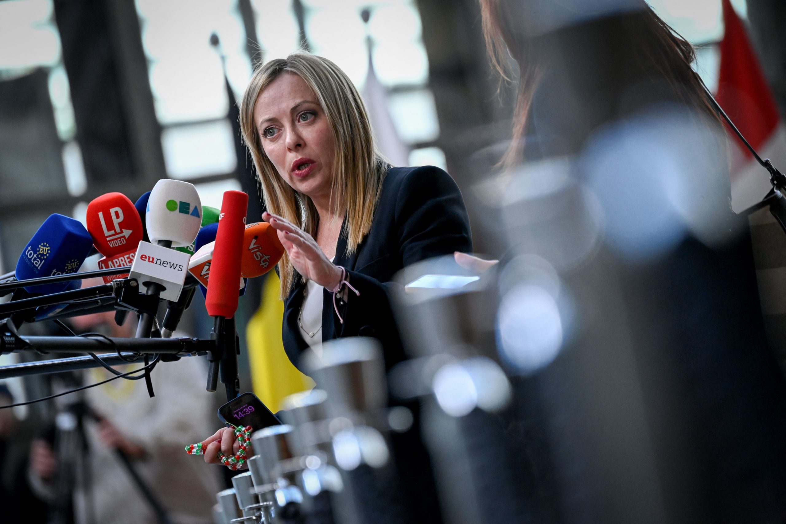 Italy's Prime Minister Giorgia Meloni speaks to media after a EU Summit, at the EU headquarters in Brussels, on March 24, 2023.