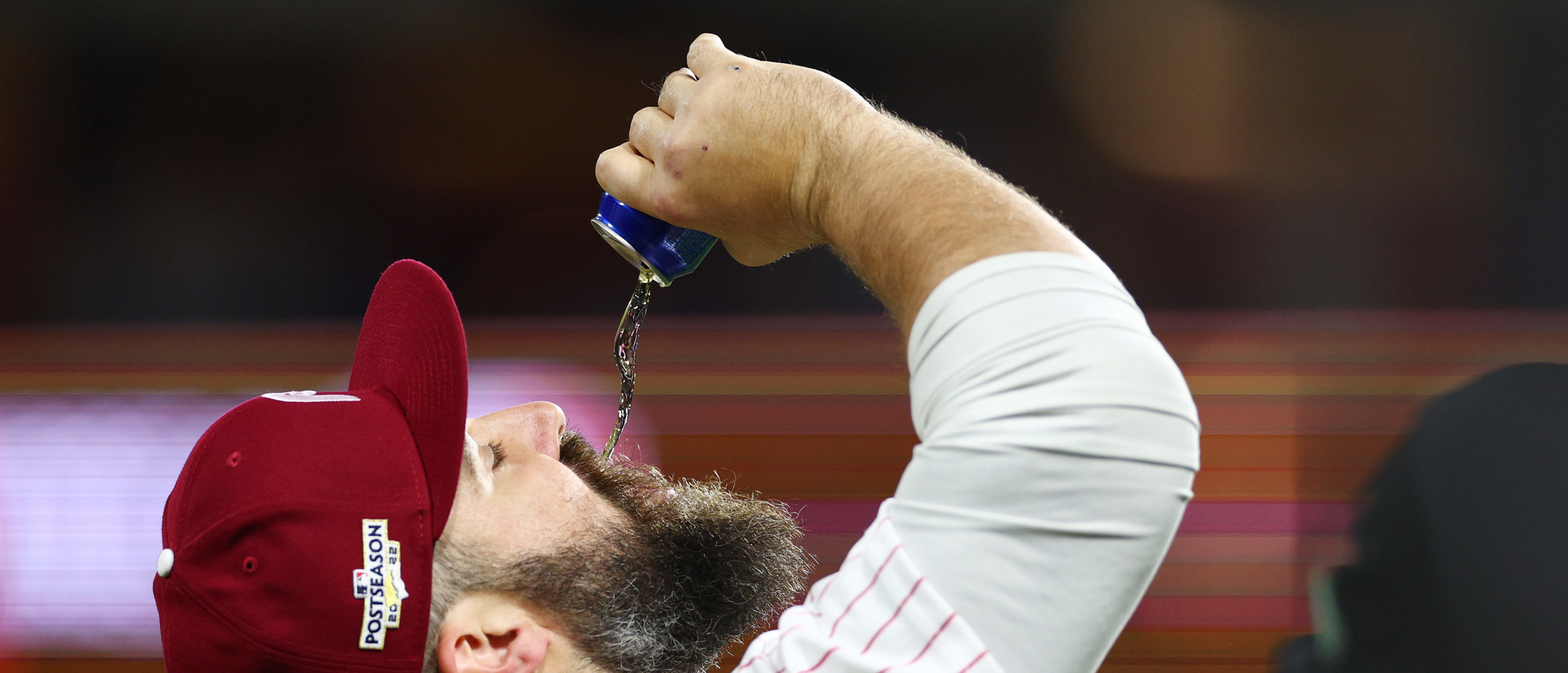PHILADELPHIA, PENNSYLVANIA - OCTOBER 21: Philadelphia Eagles player Jason Kelce pumps drinks a beer during game three of the National League Championship Series between the San Diego Padres and the Philadelphia Phillies at Citizens Bank Park on October 21, 2022 in Philadelphia, Pennsylvania. (Photo by Elsa/Getty Images)