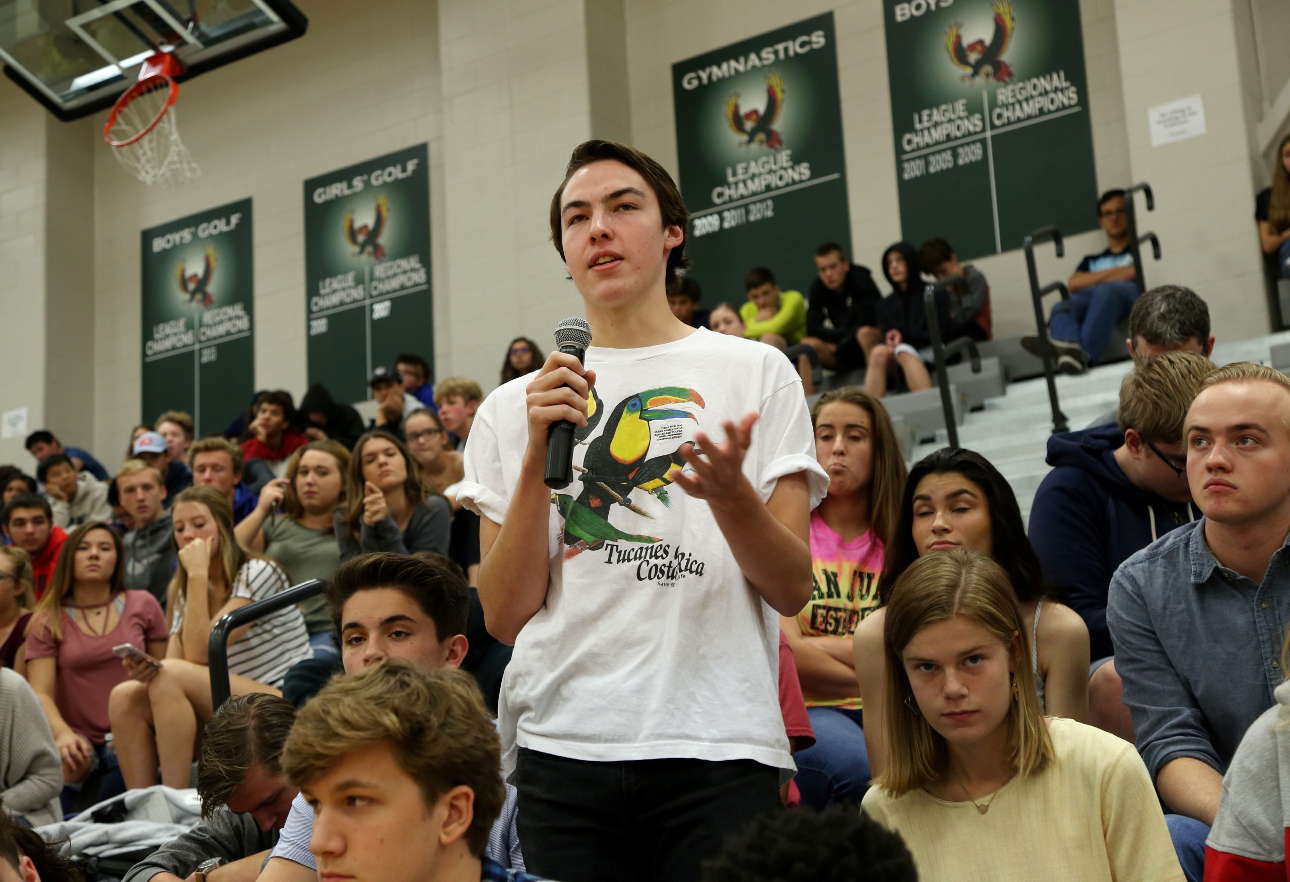 Free State High School student Chris Pendry asks as question during a forum with the four teenage candidates for Kansas Governor at Free State High School in Lawrence, Kansas, on October 19, 2017. The state of Kansas has no age restrictions for gubernatorial candidates. The mid-term election will be held on November 6, 2018. / AFP PHOTO / Christopher Smith (Photo credit should read CHRISTOPHER SMITH/AFP via Getty Images)
