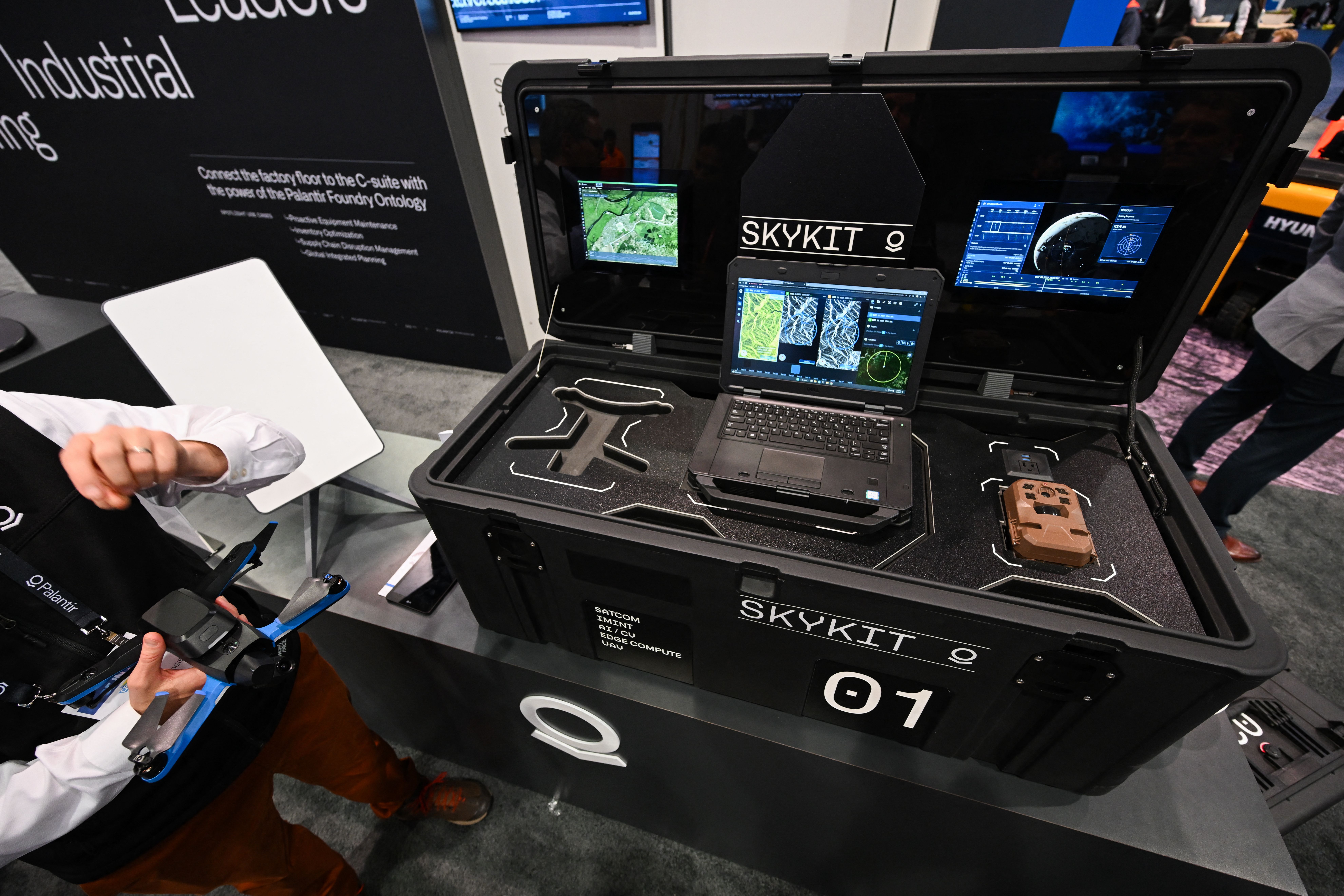 A Palantir Technologies Skykit, is displayed at the companys booth during the Consumer Electronics Show (CES) in Las Vegas, Nevada on January 5, 2023. - The Skykit incorporates the companys software along with a UAV drone, trail camera, battery packs, and a SpaceX Starlink terminal into a self-contained defense intelligence package deployable to hostile environments. 
