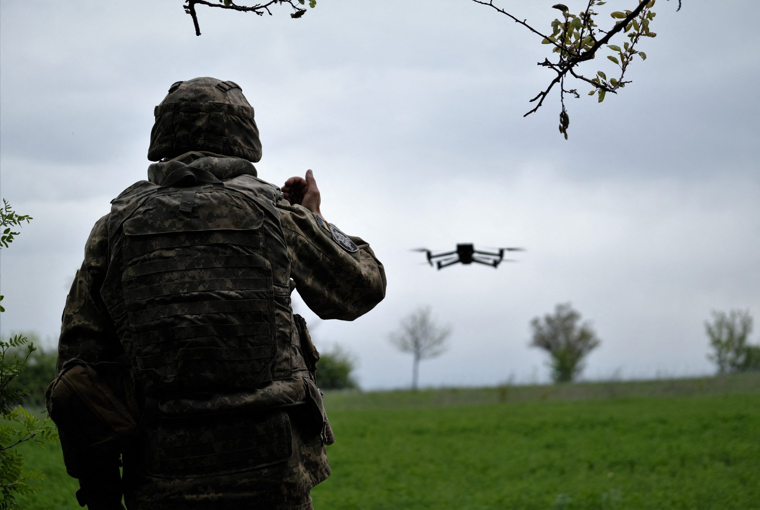 A Ukrainian serviceman of a reconnaissance team flyes a drone at a front line near the town of Bakhmut, Donetsk region on May 8, 2023, amid the Russian invasion of Ukraine.