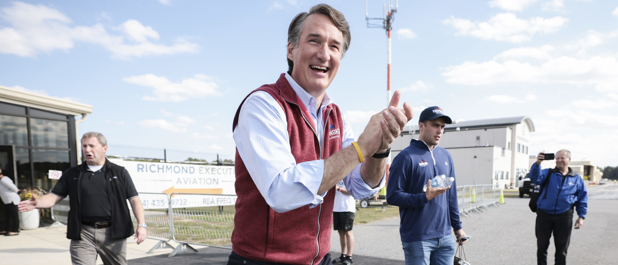 RICHMOND, VIRGINIA - NOVEMBER 01: Virginia Republican gubernatorial candidate Glenn Youngkin holds walks out of the Chesterfield County Airport after a campaign rally on November 01, 2021 in Richmond, Virginia. (Photo by Anna Moneymaker/Getty Images)
