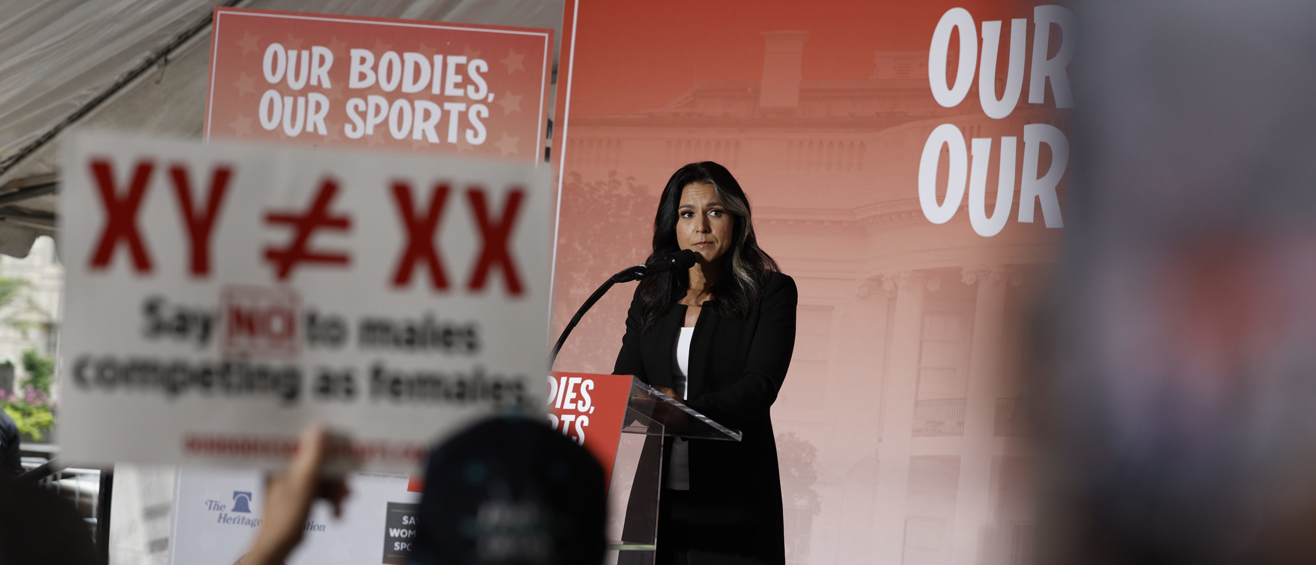 Former U.S. Rep. Tulsi Gabbard (D-HI) speaks at an "Our Bodies, Our Sports" rally to mark the 50th anniversary of Title IX at Freedom Plaza on June 23, 2022 in Washington, DC.