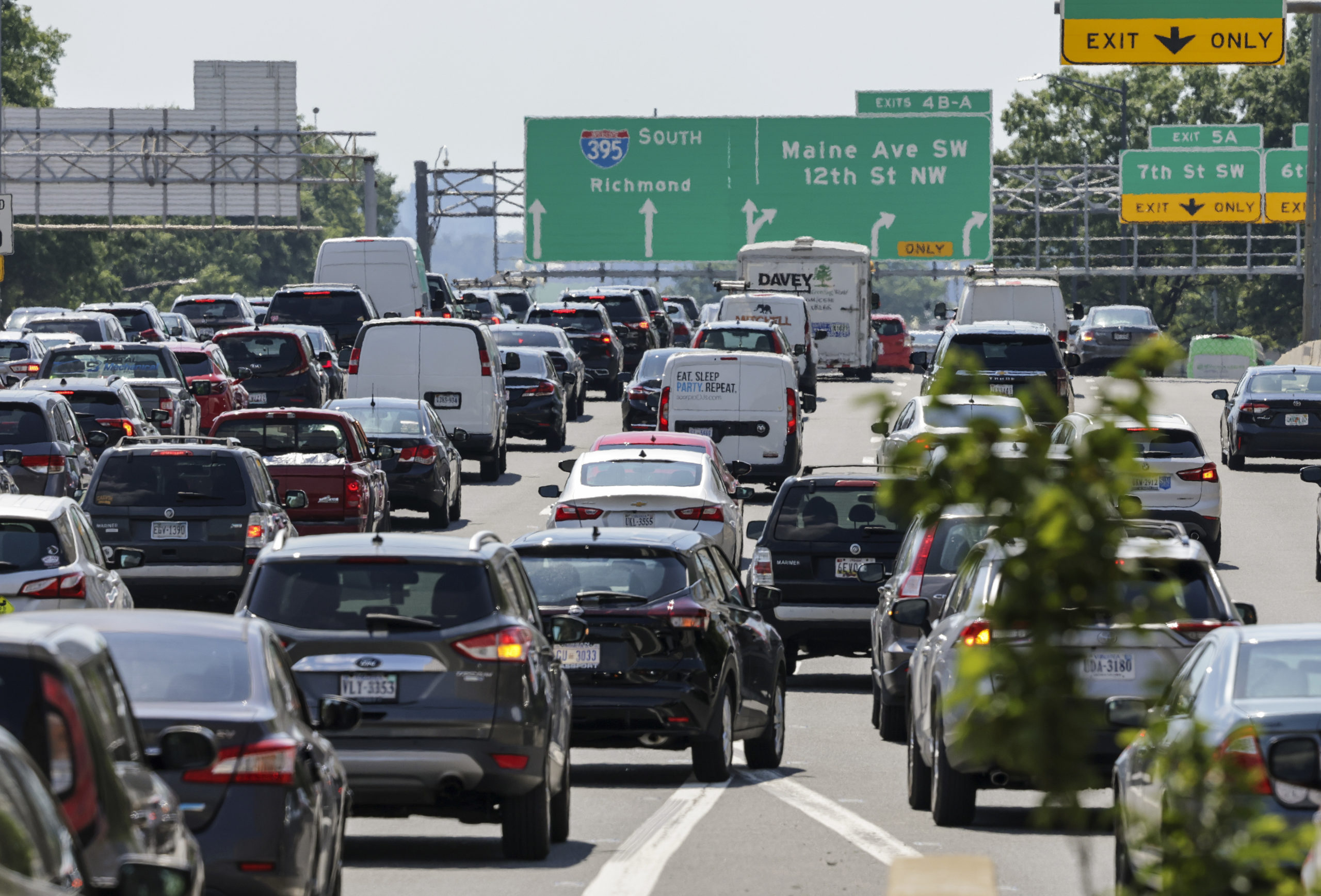WASHINGTON, DC - JUNE 30: Motorists drive in traffic on Interstate 395, the Southwest Freeway, on June 30, 2022 in Washington, DC. The Fourth of July holiday weekend is expected to see an increase in traffic with an estimated 42 million people expected to take a road trip on the long weekend, according to AAA. (Photo by Kevin Dietsch/Getty Images)