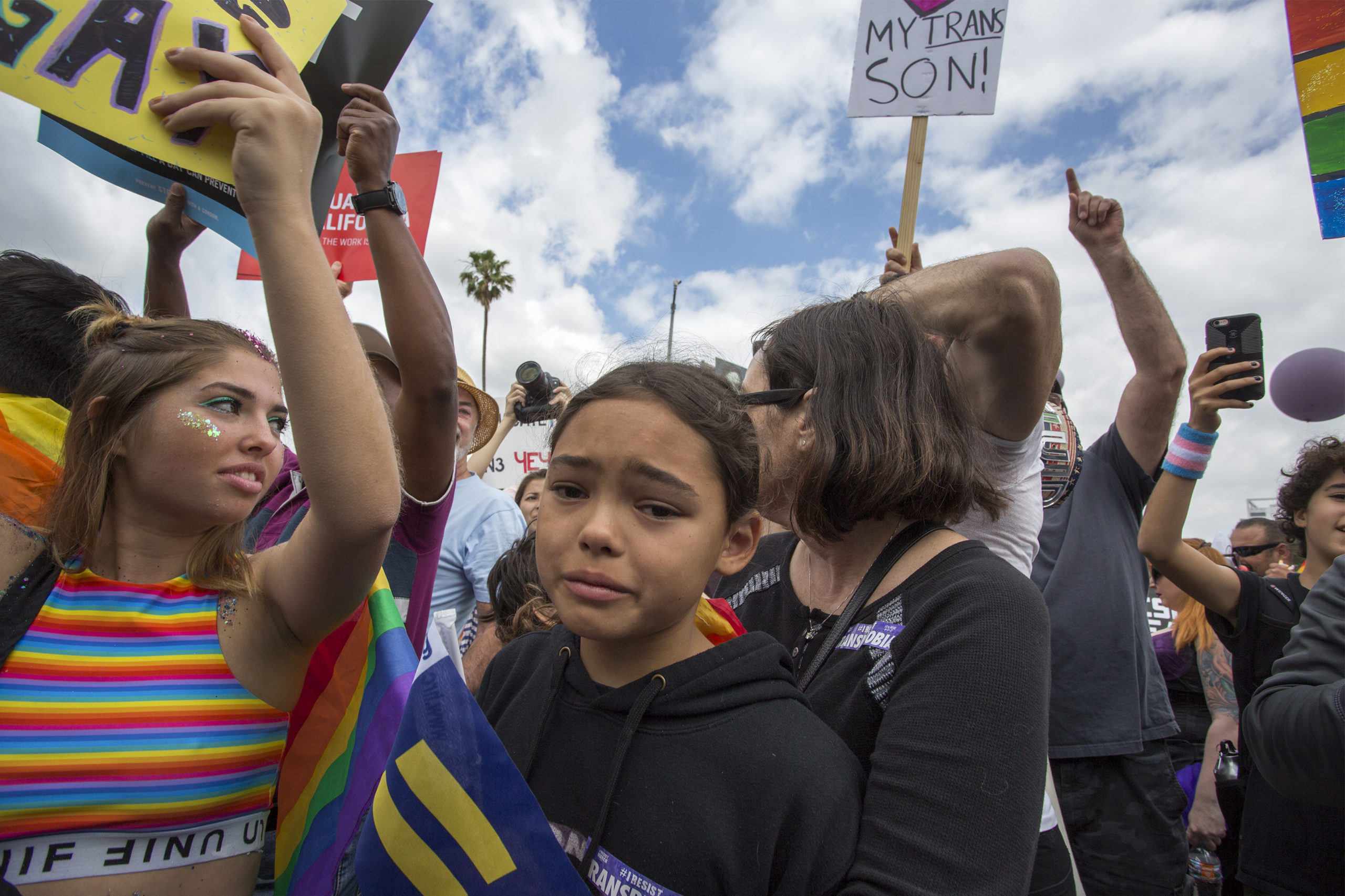 A girl reacts to hateful speech from provocative street preachers at the #ResistMarch during the 47th annual LA Pride Festival on June 11, 2017, in the Hollywood section of Los Angeles and West Hollywood, California. Inspired by the huge womenÕs marches that took place around the world following the inauguration of President Donald Trump and by the early pride demonstrations of the 1970s, LA Pride replaced its decades-old parade with the #ResistMarch protest to promote human rights by marching from Hollywood to West Hollywood. (Photo by David McNew/Getty Images)