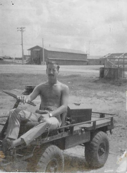 Gerry Wingert sits on a Jeep during his time serving in the Army during the Vietnam War. (Karen Battersby)