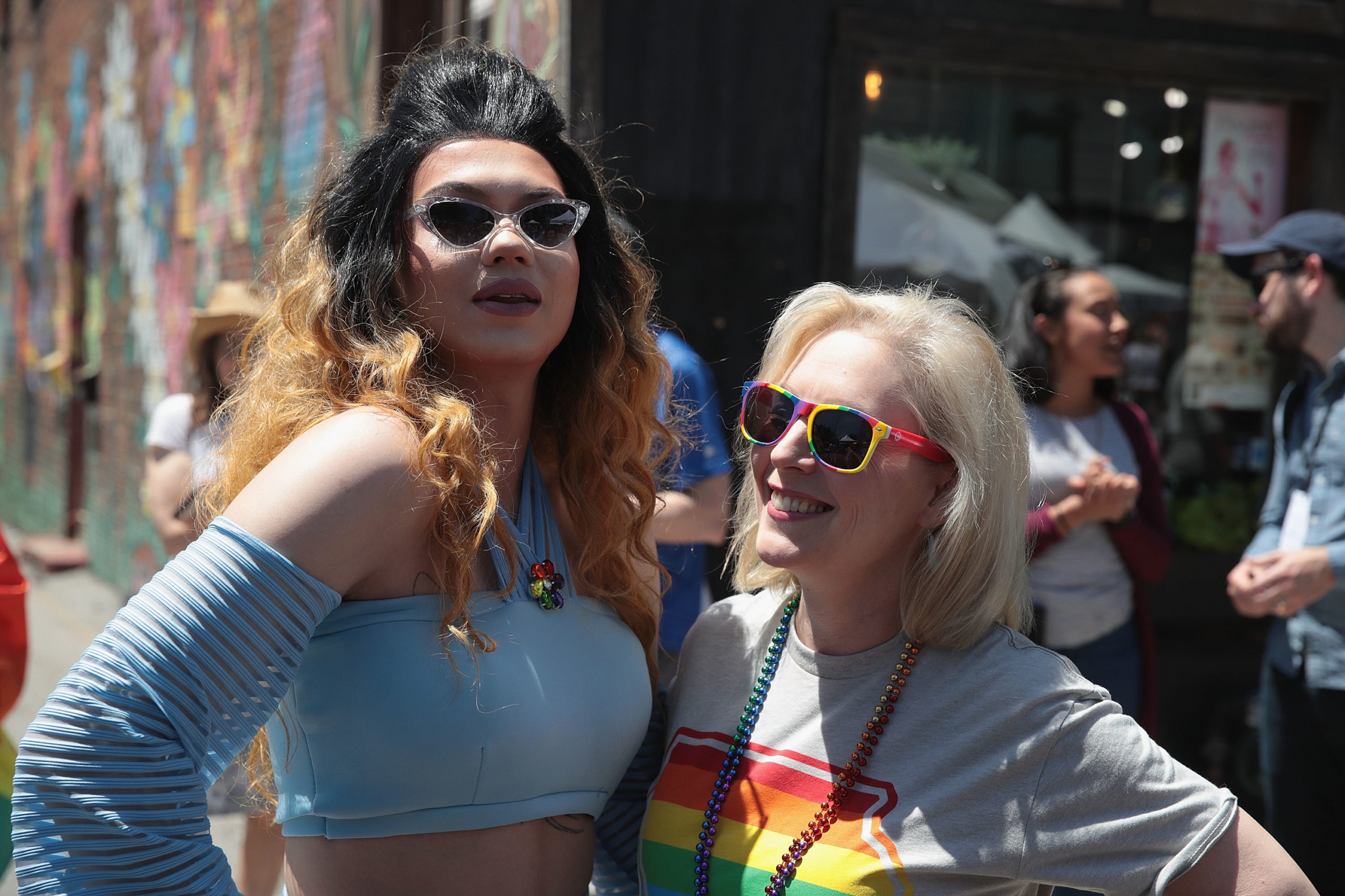 Democratic presidential candidate and New York senator Kirsten Gillibrand (R) tours the Capital City Pride Fest with drag queen Vana Rosenberg on June 08, 2019 in Des Moines, Iowa. Most of the more than 20 candidates seeking the Democratic nomination for president are campaigning at various locations in Iowa this weekend. (Photo by Scott Olson/Getty Images)