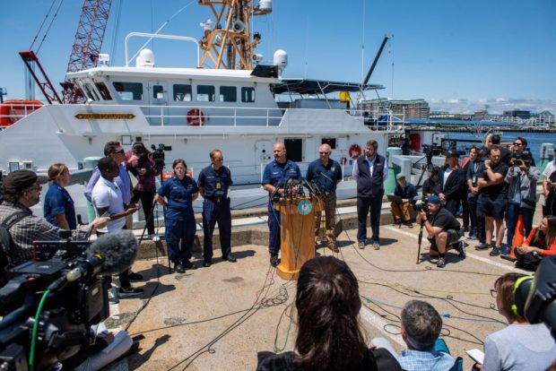 US Coast Guard (USCG) Captain Jamie Frederick speaks to reporters about the search efforts for the Titan submersible that went missing near the wreck of the Titanic, at Coast Guard Base in Boston, Massachusetts, on June 21, 2023. The USCG said Wednesday it had not identified the source of underwater noises detected by sonar in the search for the missing submersible. "We don't know what they are, to be frank with you," Frederick said regarding the sounds that had raised hopes the five people onboard are still alive. "We have to remain optimistic and hopeful when you're in a search and rescue case," he told reporters. (Photo by Joseph Prezioso / AFP) (Photo by JOSEPH PREZIOSO/AFP via Getty Images)