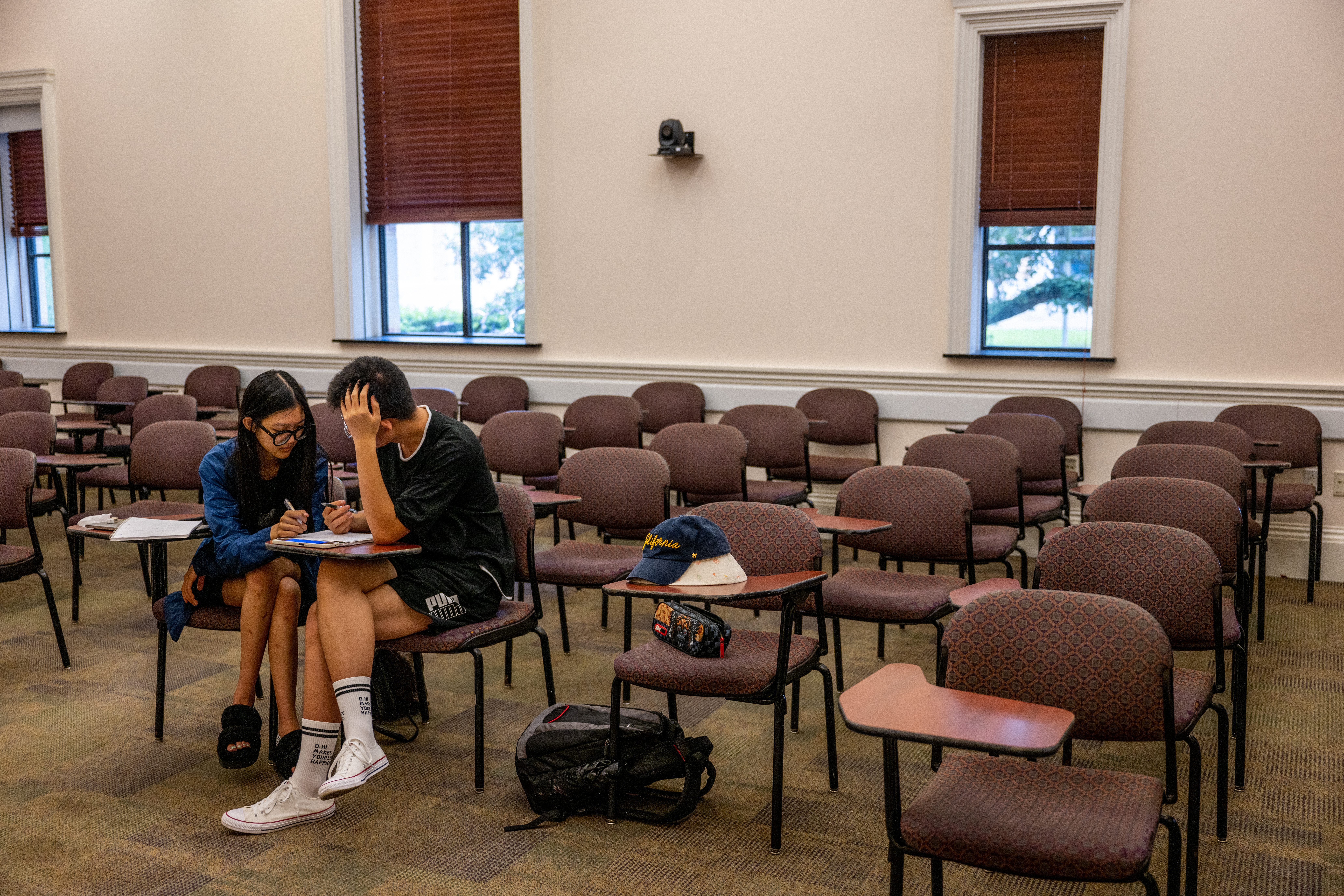 Two students study in a classroom at Rice University on August 29, 2022 in Houston, Texas. U.S. President Joe Biden has announced a three-part plan that will forgive hundreds of billions of dollars in federal student loan debt. Since announced, the plan has sparked controversy as critics have begun questioning its fairness, and addressing concerns over its impact on inflation. (Photo by Brandon Bell/Getty Images)