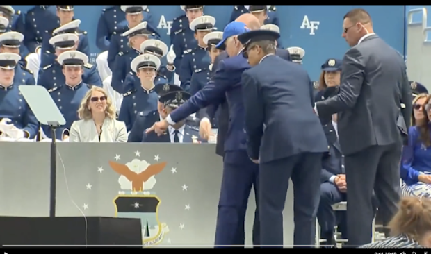 President Joe Biden falls during graduation ceremony [Twitter Screenshot Jake Schneider]