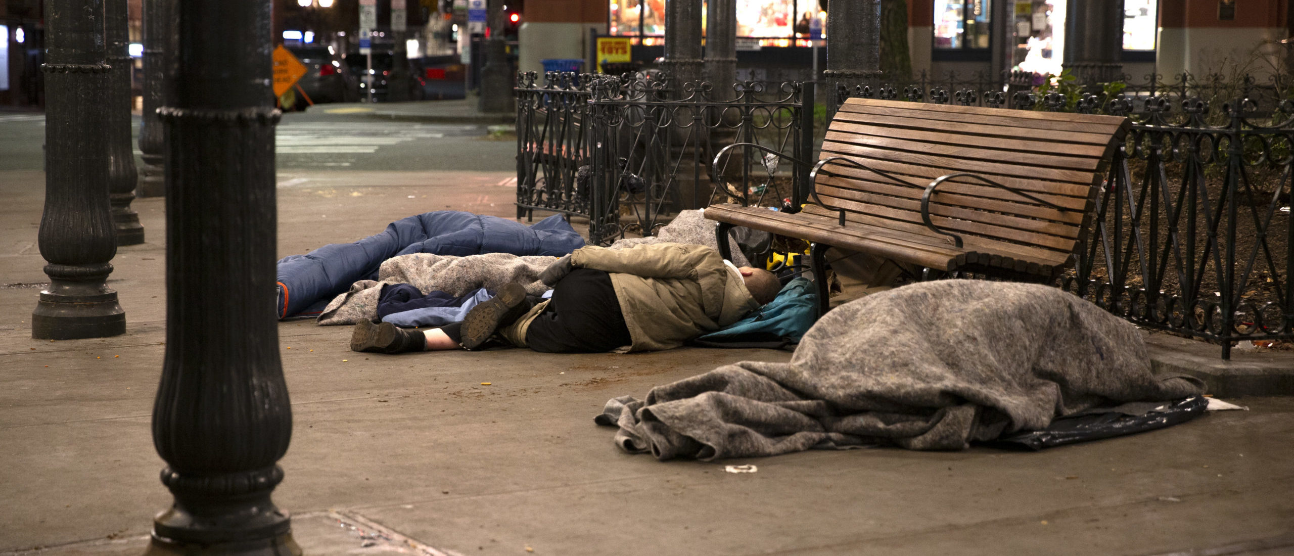 SEATTLE, WA - APRIL 06: People sleep outside on a sidewalk on April 6, 2020 in Seattle, Washington. (Photo by Karen Ducey/Getty Images)