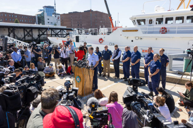 BOSTON, MASSACHUSETTS - JUNE 22: Rear Adm. John Mauger, the First Coast Guard District commander, gives an update on the search efforts for five people aboard a missing submersible approximately 900 miles off Cape Cod, on June 22, 2023 in Boston, Massachusetts. Remnants believed to be of the Titan submersible were found approximately 1,600 feet from the bow of the Titanic on the sea floor, according to the US Coast Guard, and all five occupants are believed to be dead. (Photo by Scott Eisen/Getty Images)