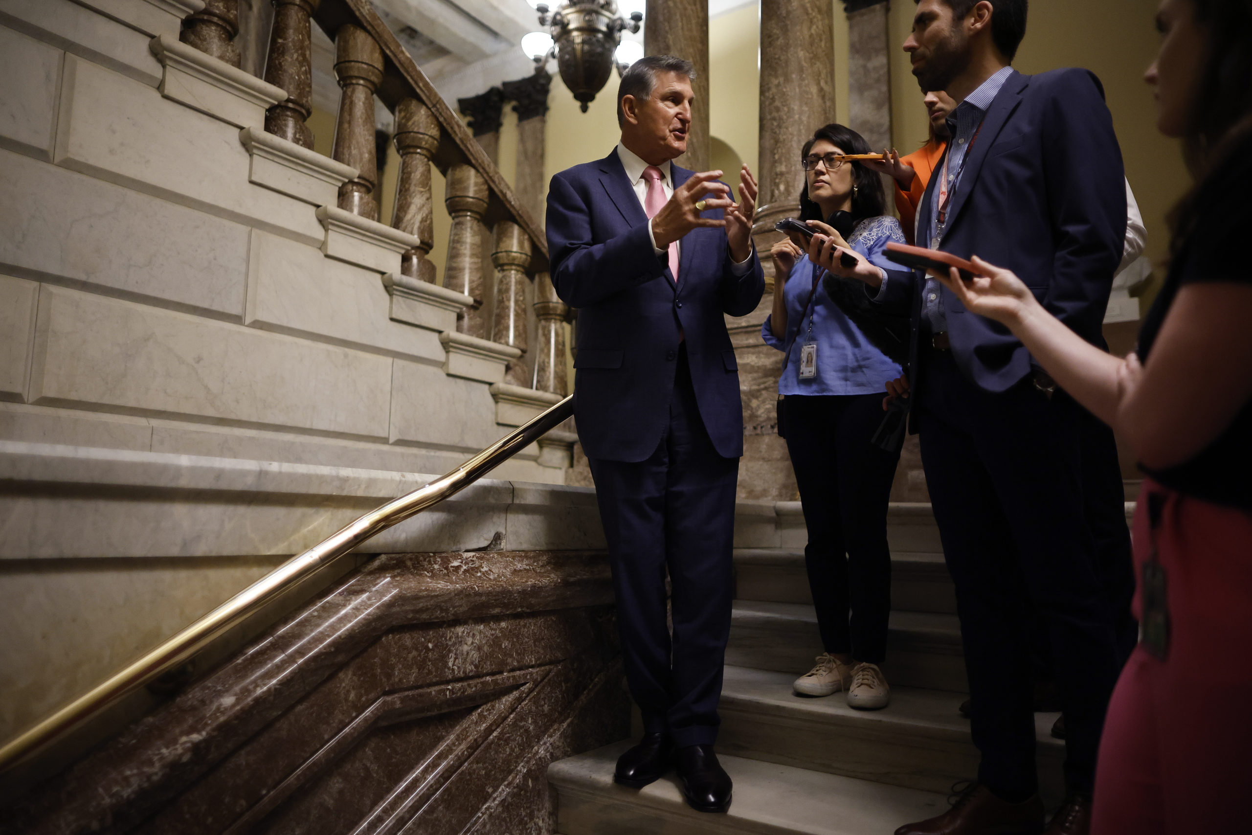 WASHINGTON, DC - JUNE 01: Sen. Joe Manchin (D-WV) (L) talks with reporters in between votes at the U.S. Capitol on June 01, 2023 in Washington, DC. The Senate has taken up legislation to raise the debt limit and avoid a default that was negotiated between House Republicans and the White House. (Photo by Chip Somodevilla/Getty Images)