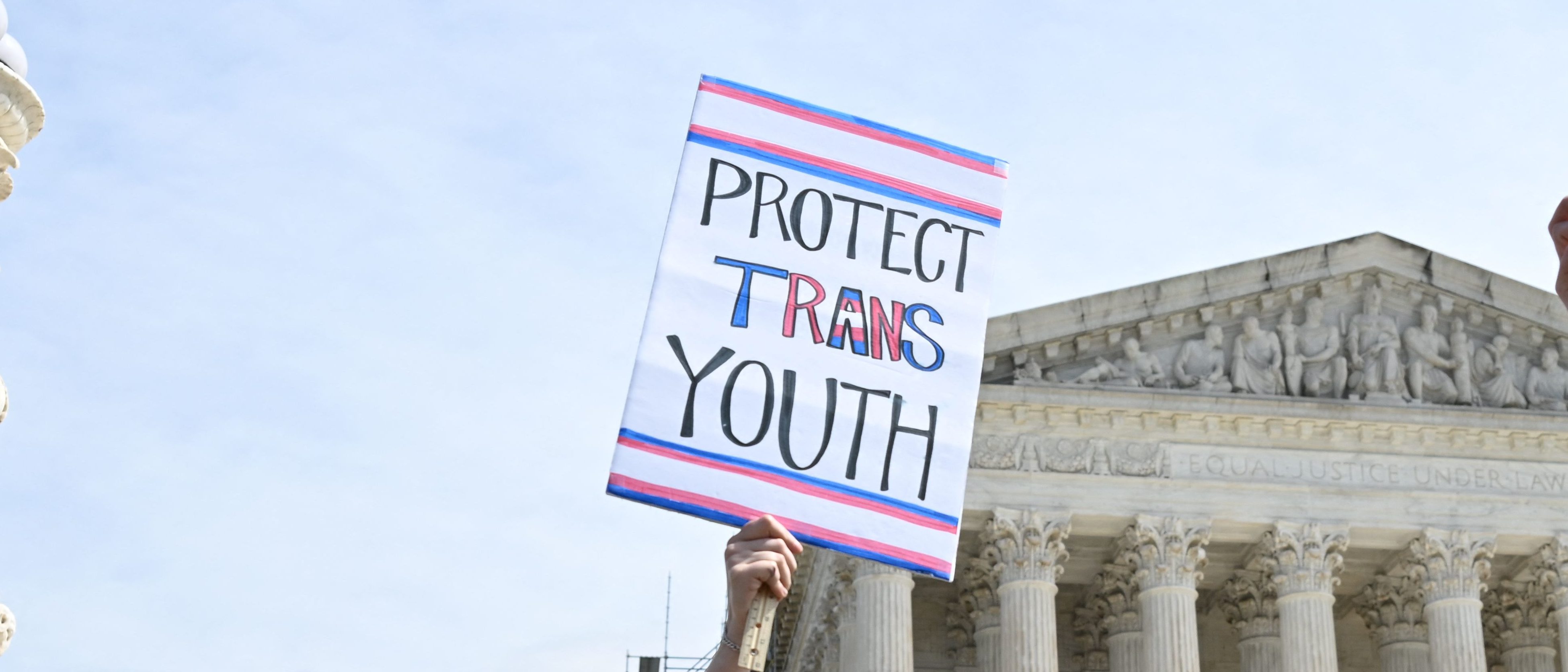 Activists for transgender rights gather in front of the US Supreme Court in Washington, DC, on April 1, 2023. (Photo by ANDREW CABALLERO-REYNOLDS / AFP) (Photo by ANDREW CABALLERO-REYNOLDS/AFP via Getty Images)