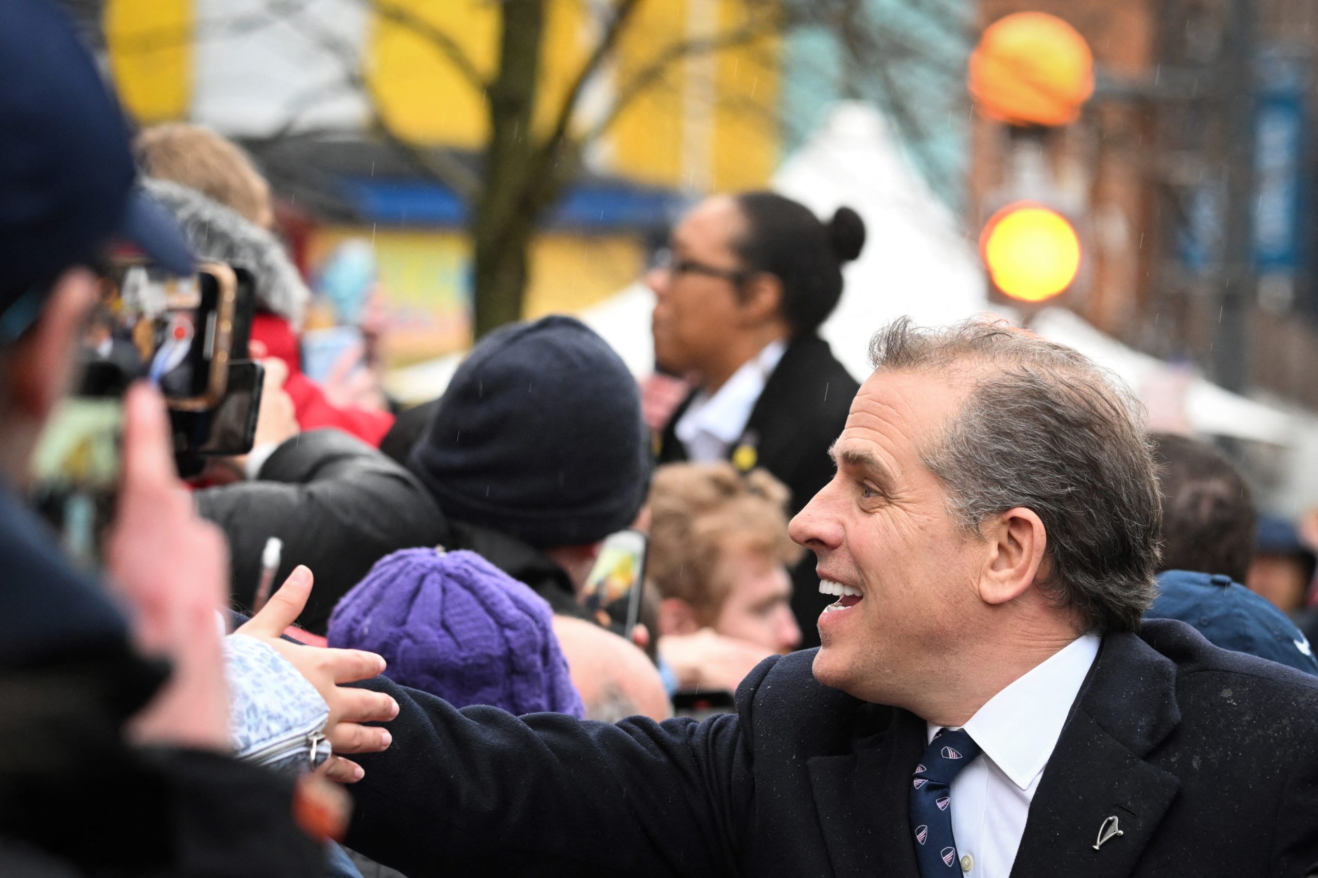 Hunter Biden, US President Joe Biden's son, greets members of the public during a walking tour of Dowtown Dundalk, on April 12, 2023, as part of a four day trip to Northern Ireland and Ireland for the 25th anniversary commemorations of the "Good Friday Agreement". (Photo by Jim WATSON / AFP) (Photo by JIM WATSON/AFP via Getty Images)