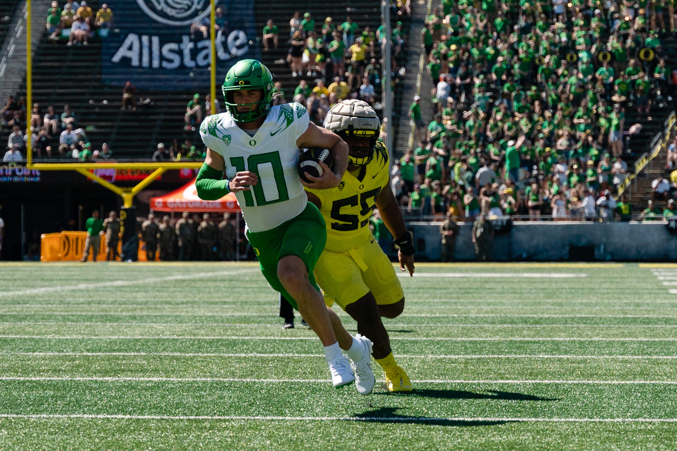 EUGENE, OR - APRIL 29: Quarterback Bo Nix #10 of the Oregon Ducks runs the ball in for a touchdown during the second half of the Oregon Ducks Spring Football Game at Autzen Stadium on April 29, 2023 in Eugene, Oregon. (Photo by Ali Gradischer/Getty Images)