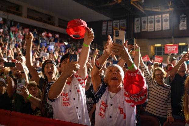ERIE, PENNSYLVANIA - JULY 29: Trump supporters cheer as former U.S. President Donald Trump enters Erie Insurance Arena for a political rally while campaigning for the GOP nomination in the 2024 election on July 29, 2023 in Erie, Pennsylvania. (Photo by Jeff Swensen/Getty Images)