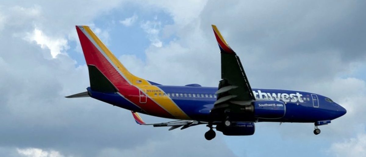 A Southwest Airlines Boeing 737-700 approaches to land at Ronald Reagan Washington National Airport in Arlington Virginia, on August 11, 2023. (Photo by Daniel SLIM / AFP) (Photo by DANIEL SLIM/AFP via Getty Images)