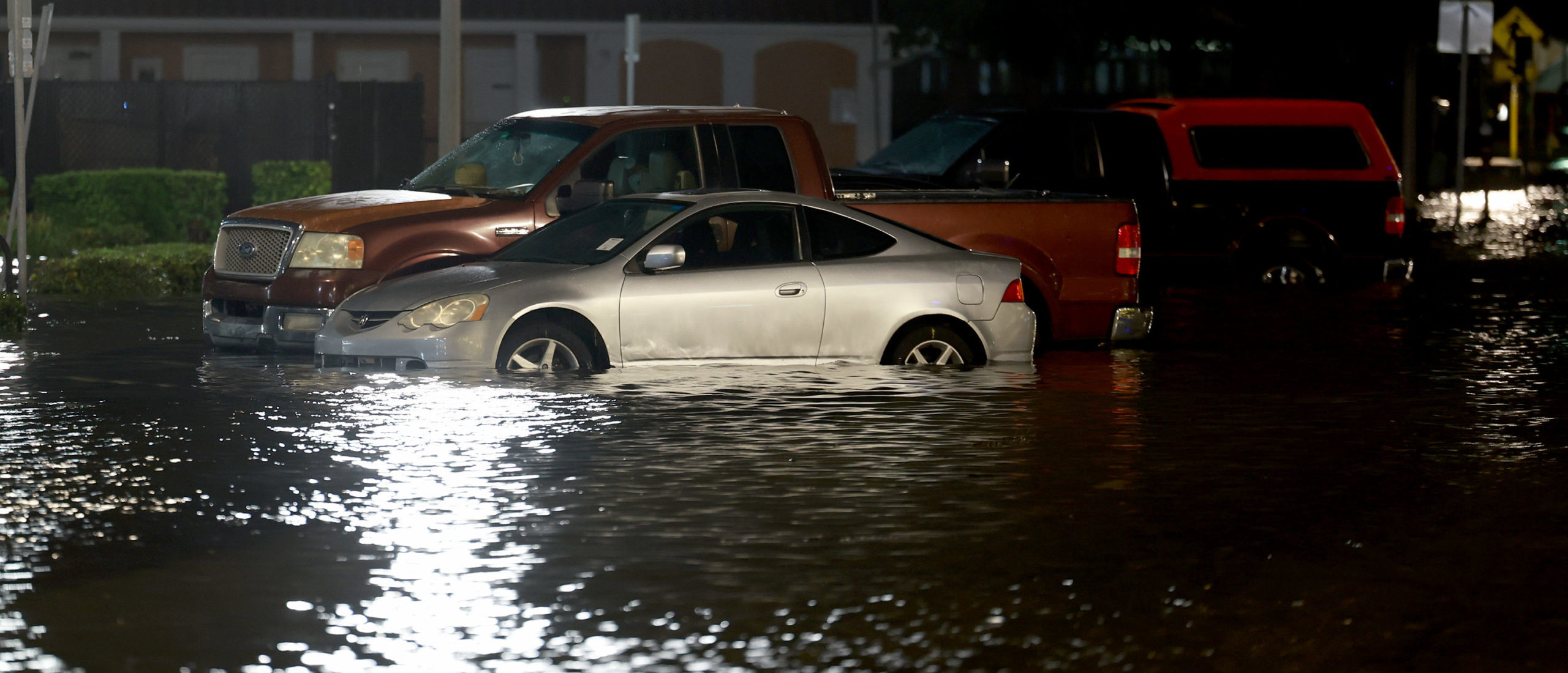 ST PETERSBURG, FLORIDA - AUGUST 30: Vehicles sit in a flooded street caused by Hurricane Idalia passing offshore on August 30, 2023 in St. Petersburg, Florida. Hurricane Idalia is hitting the Big Bend area of Florida. (Photo by Joe Raedle/Getty Images)