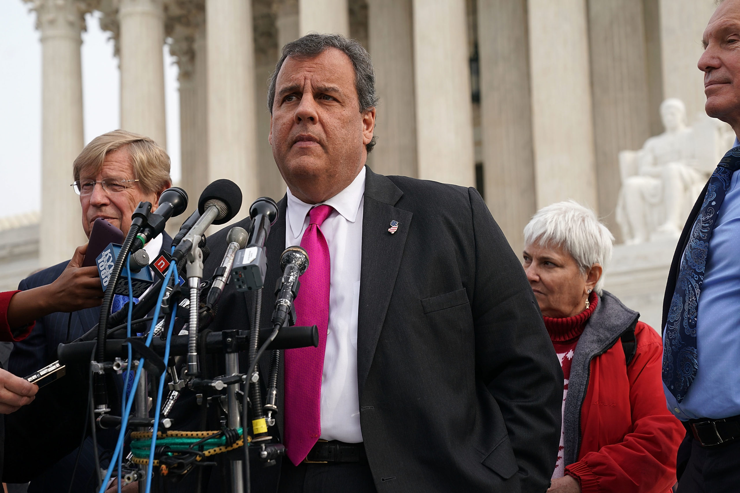 WASHINGTON, DC - DECEMBER 04: New Jersey Governor Chris Christie (2nd L) speaks to members of the media as attorney Ted Olson (L) looks on in front of the U.S. Supreme Court December 4, 2017 in Washington, DC. (Photo by Alex Wong/Getty Images)