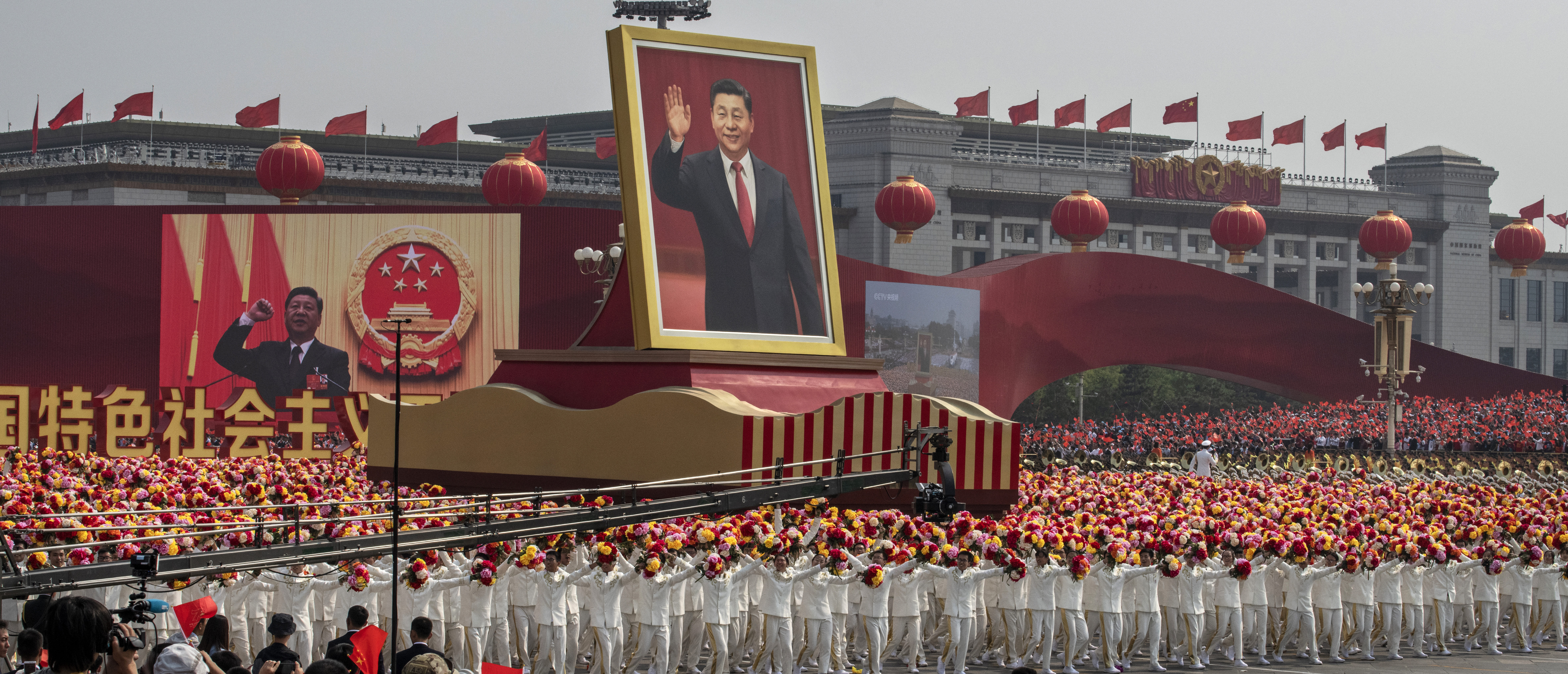 A giant portrait of General Secretary Xi Jinping is carried atop a float at a parade to celebrate the 70th Anniversary of the founding of the People's Republic of China at Tiananmen Square on October 1, 2019 in Beijing, China. (Photo by Kevin Frayer/Getty Images)