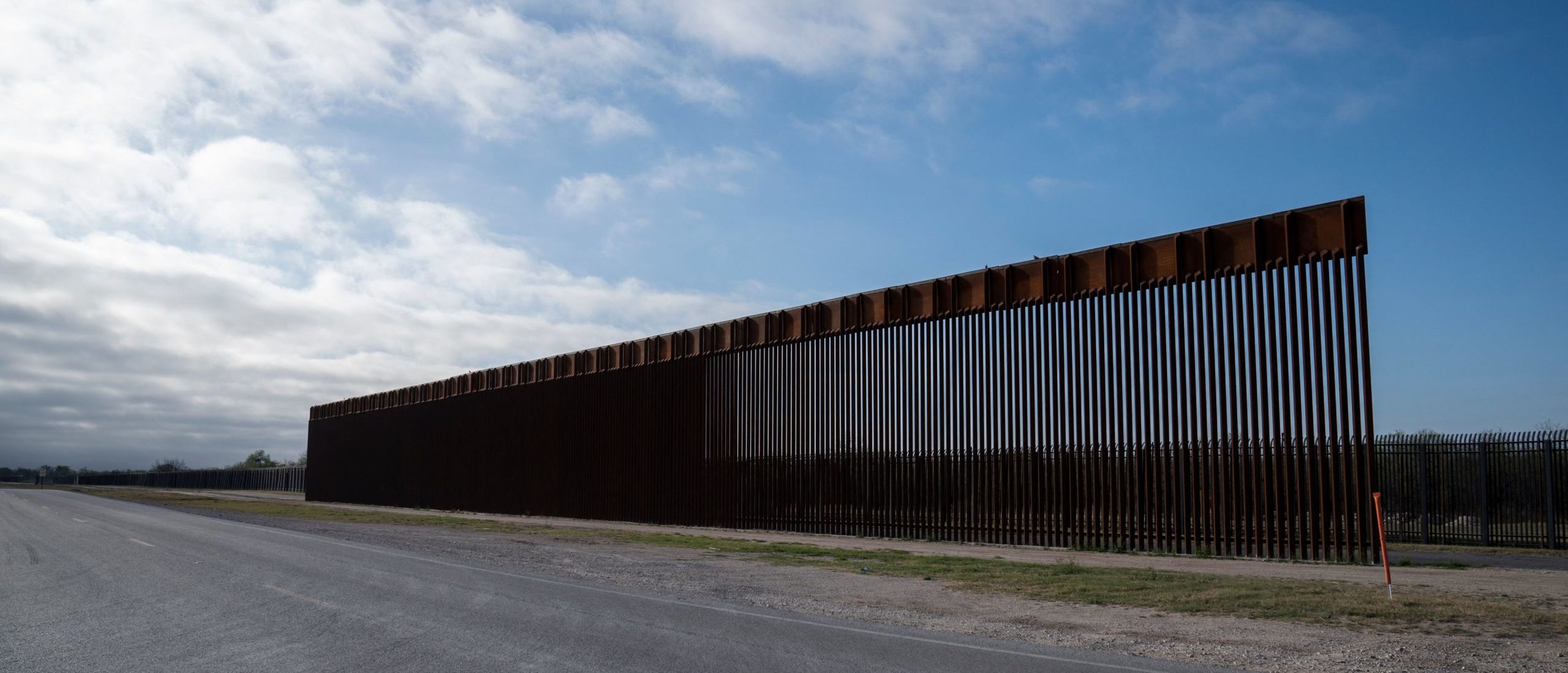 TOPSHOT - A segment of the new border wall is seen in front of the older border wall in Del Rio, Texas on March 5, 2023. (Photo by VERONICA G. CARDENAS / AFP) (Photo by VERONICA G. CARDENAS/AFP via Getty Images)
