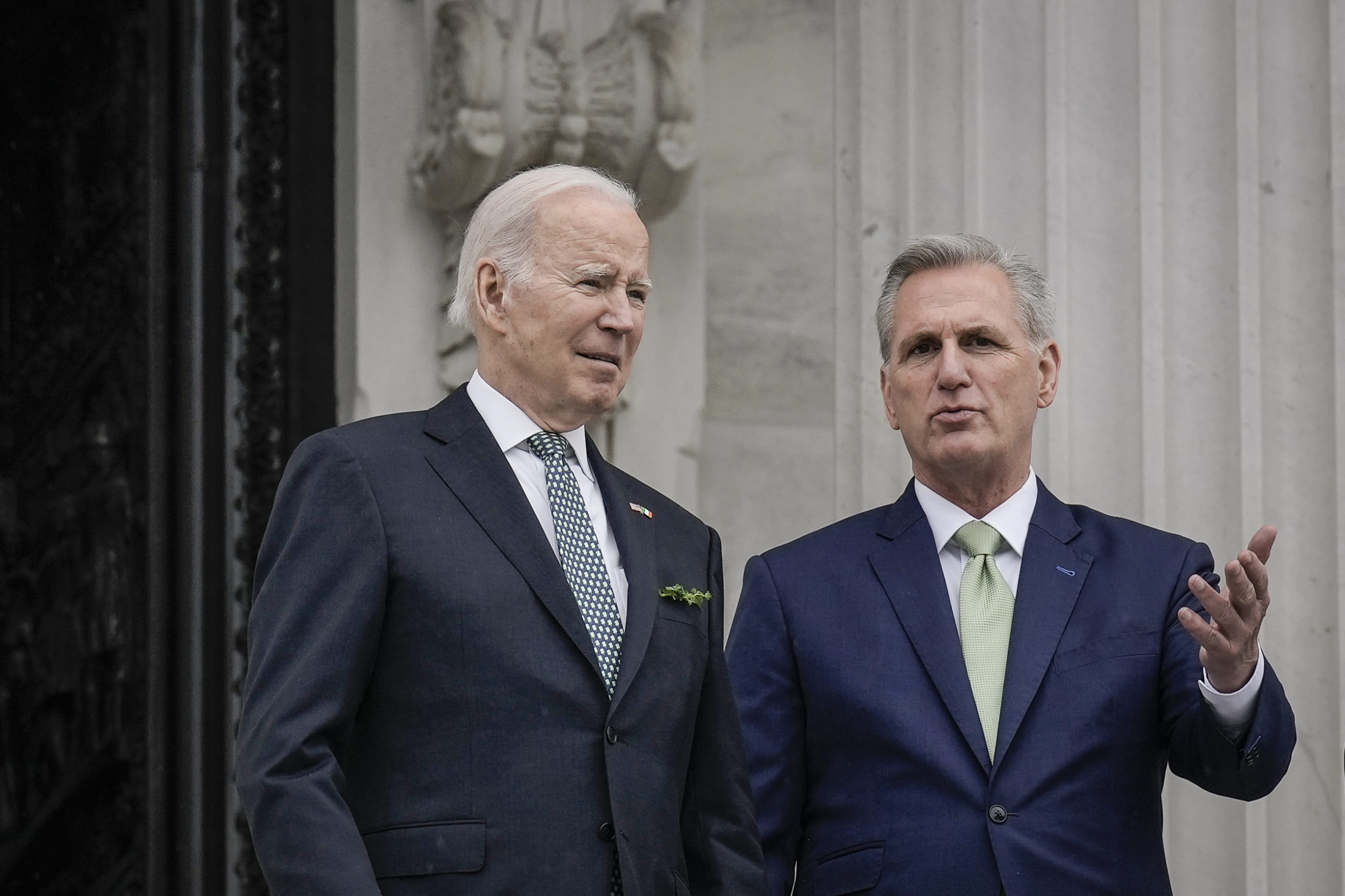 (L-R) U.S. President Joe Biden and Speaker of the House Kevin McCarthy (R-CA) talk as they depart the U.S. Capitol following the Friends of Ireland Luncheon on Saint Patrick's Day March 17, 2023 in Washington, DC. The Friends of Ireland caucus was founded in 1981 by the late Irish-American politicians Irish-American politicians Sen. Ted Kennedy (D-MA), Sen. Daniel Moynihan (D-NY) and former Speaker of the House Tip ONeill (D-MA). (Photo by Drew Angerer/Getty Images)