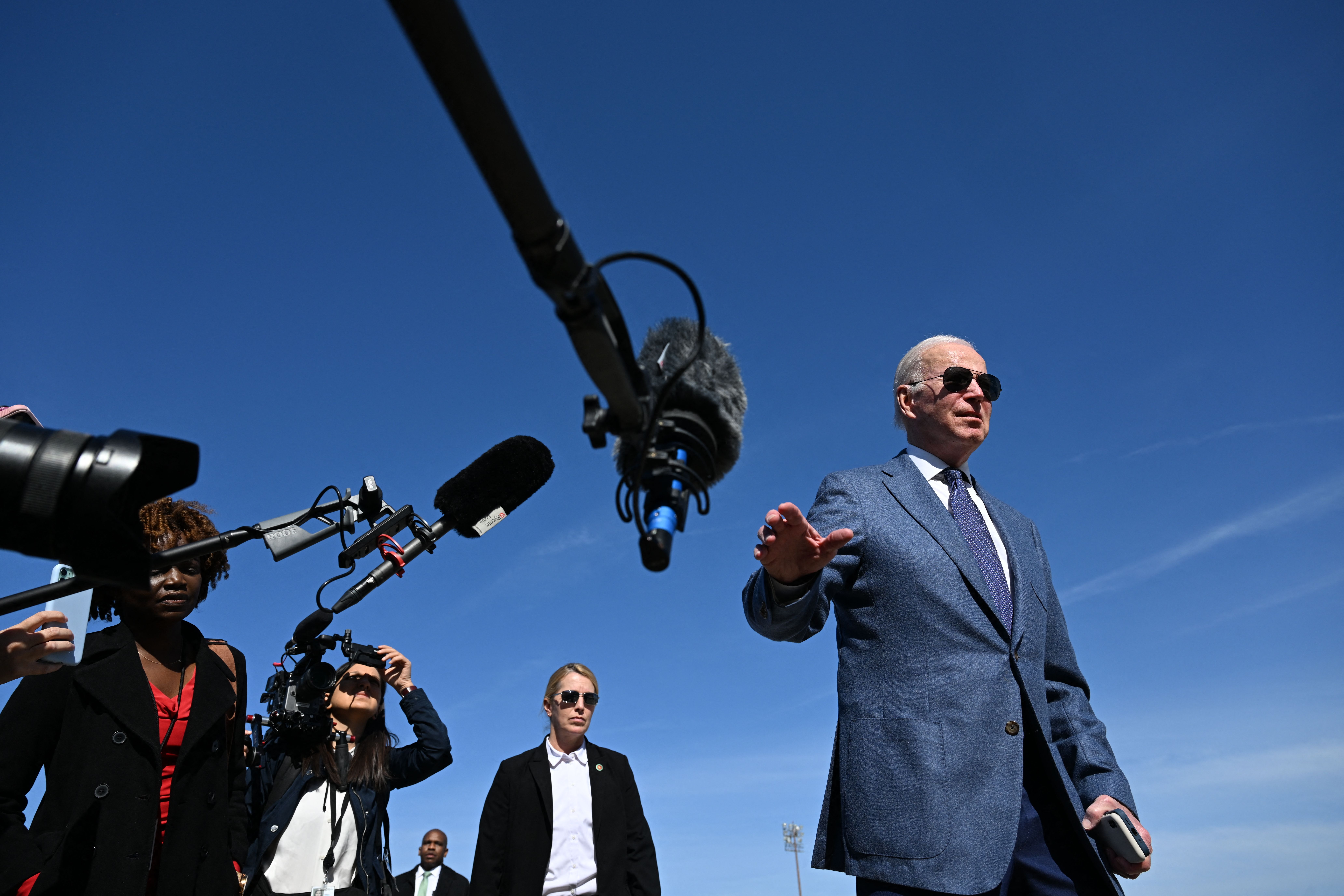 US President Joe Biden speaks to the press before boarding Air Force One, as he departs for Northern Ireland, at Joint Base Andrews in Maryland on April 11, 2023. (Photo by Jim WATSON / AFP) (Photo by JIM WATSON/AFP via Getty Images)