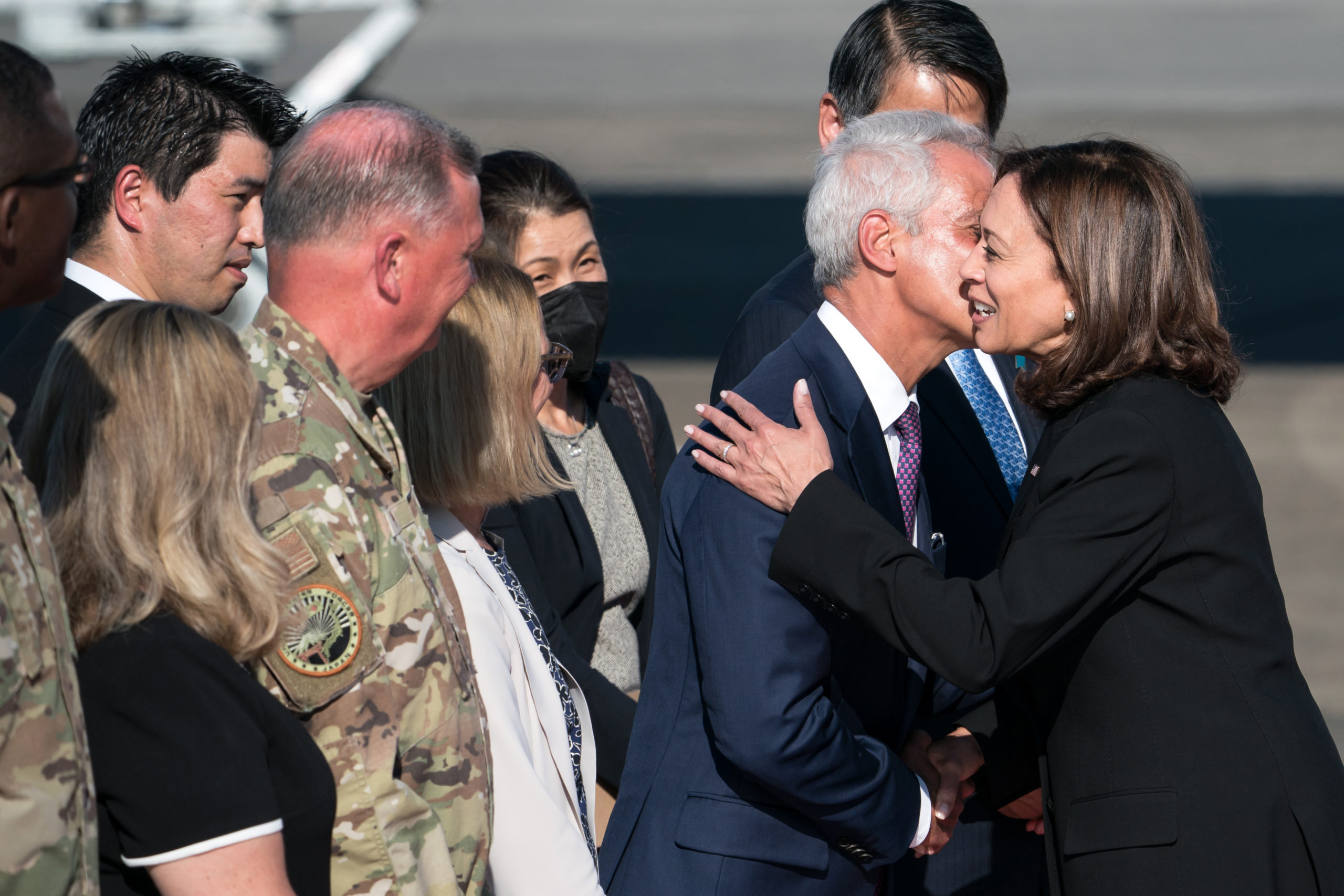 U.S. Vice President Kamala Harris (R) is greeted by U.S. Ambassador to Japan Rahm Emanuel arrives at the Yokota Air Base on 26 September 2022, in Fussa, Tokyo, Japan. Dignitaries including several current and former heads of state are visiting Japan for the state funeral of former prime minister Shinzo Abe, which will be held on Tuesday. (Photo by Tomohiro Ohsumi/Getty Images)
