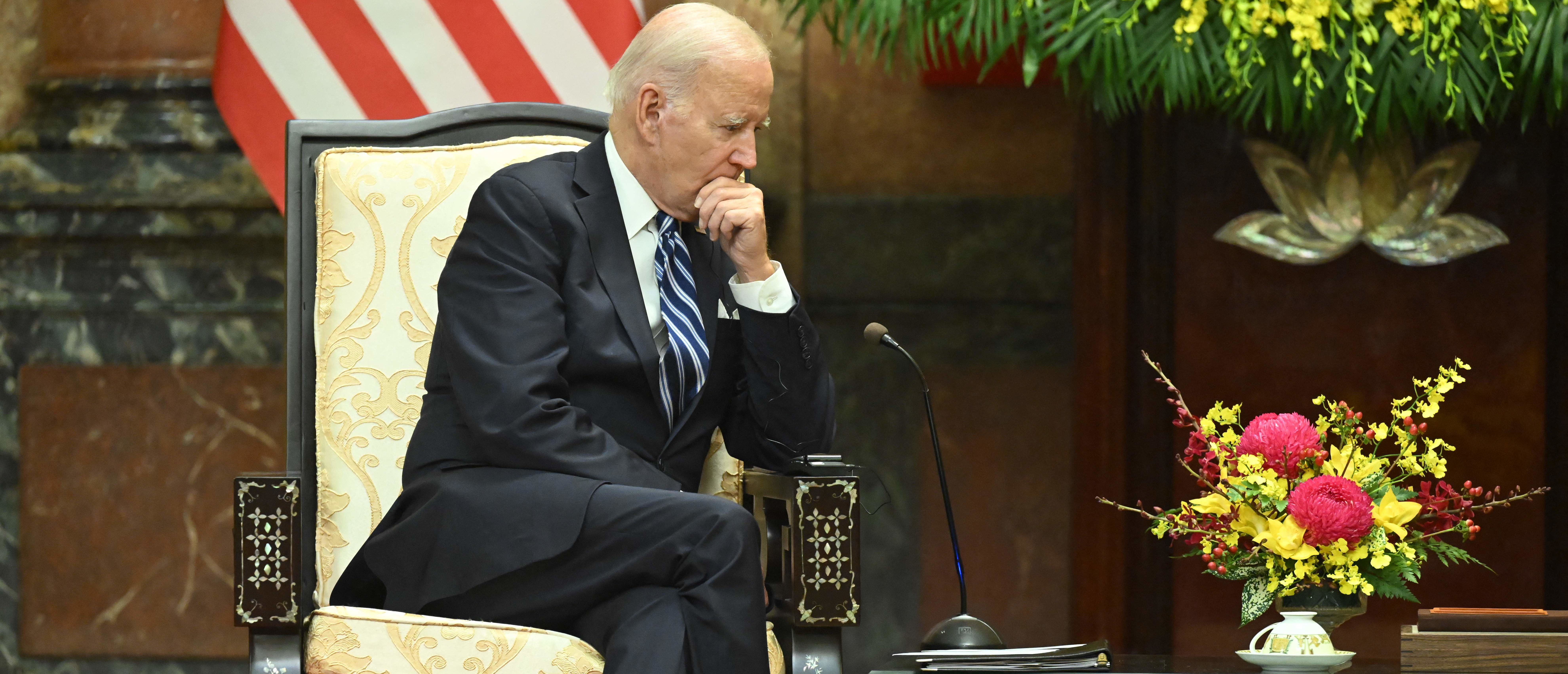 TOPSHOT - US President Joe Biden listens to Vietnam's President Vo Van Thuong during a meeting at the Presidential Palace in Hanoi on September 11, 2023. The United States and Vietnam warned against the "threat or use of force" in the disputed South China Sea, days after the latest clash involving Chinese vessels. (Photo by SAUL LOEB / AFP) (Photo by SAUL LOEB/AFP via Getty Images)