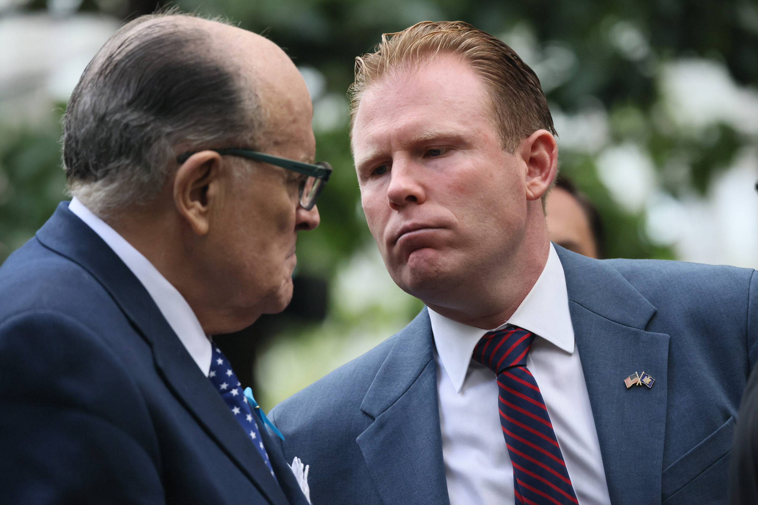 Former New York City Mayor and attorney of former US President Donald Trump, Rudy Giuliani and his son Andrew Giuliani speak during the annual 9/11 Commemoration Ceremony at the National 9/11 Memorial and Museum on September 11, 2023 in New York City. Family and friends honored the lives of their loved ones on the 22nd anniversary of the terror attacks of September 11, 2001, at the World Trade Center, Shanksville, PA and the Pentagon, that killed nearly 3,000 people. (Photo by Michael M. Santiago/Getty Images)