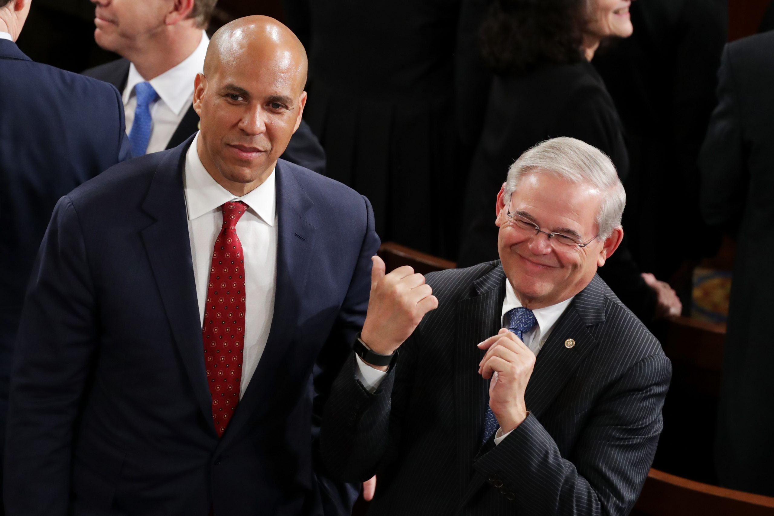 WASHINGTON, DC - FEBRUARY 28: Sen. Cory Booker (D-NJ) and Sen. Bob Menendez (D-NJ) arrive to a joint session of the U.S. Congress with U.S. President Donald Trump on February 28, 2017 in the House chamber of the U.S. Capitol in Washington, DC. (Photo by Chip Somodevilla/Getty Images)