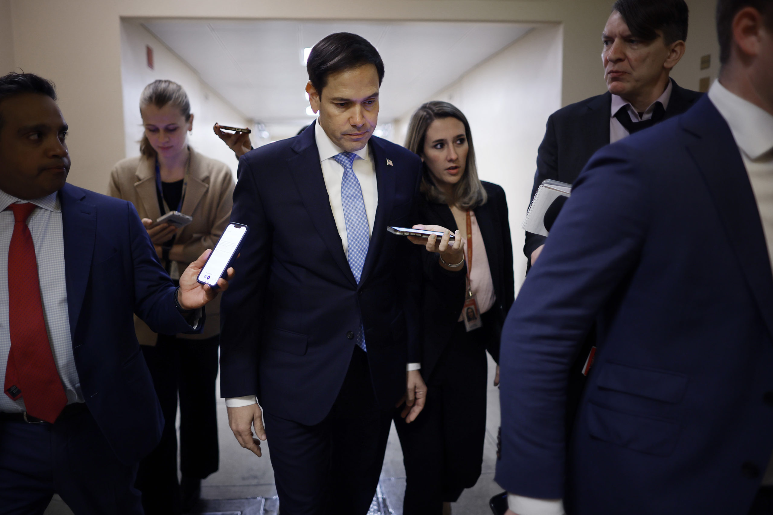 Senate Select Committee on Intelligence Vice Chairman Marco Rubio (R-FL) is beset by reporters as he walks through the basement of the U.S. Capitol on February 28, 2023 in Washington, DC. Members of the "Gang of 8," including Rubio, will be briefed on the documents with classified markings that were found at the residences and offices of former President Donald Trump, President Joe Biden and former Vice President Mike Pence. (Photo by Chip Somodevilla/Getty Images)