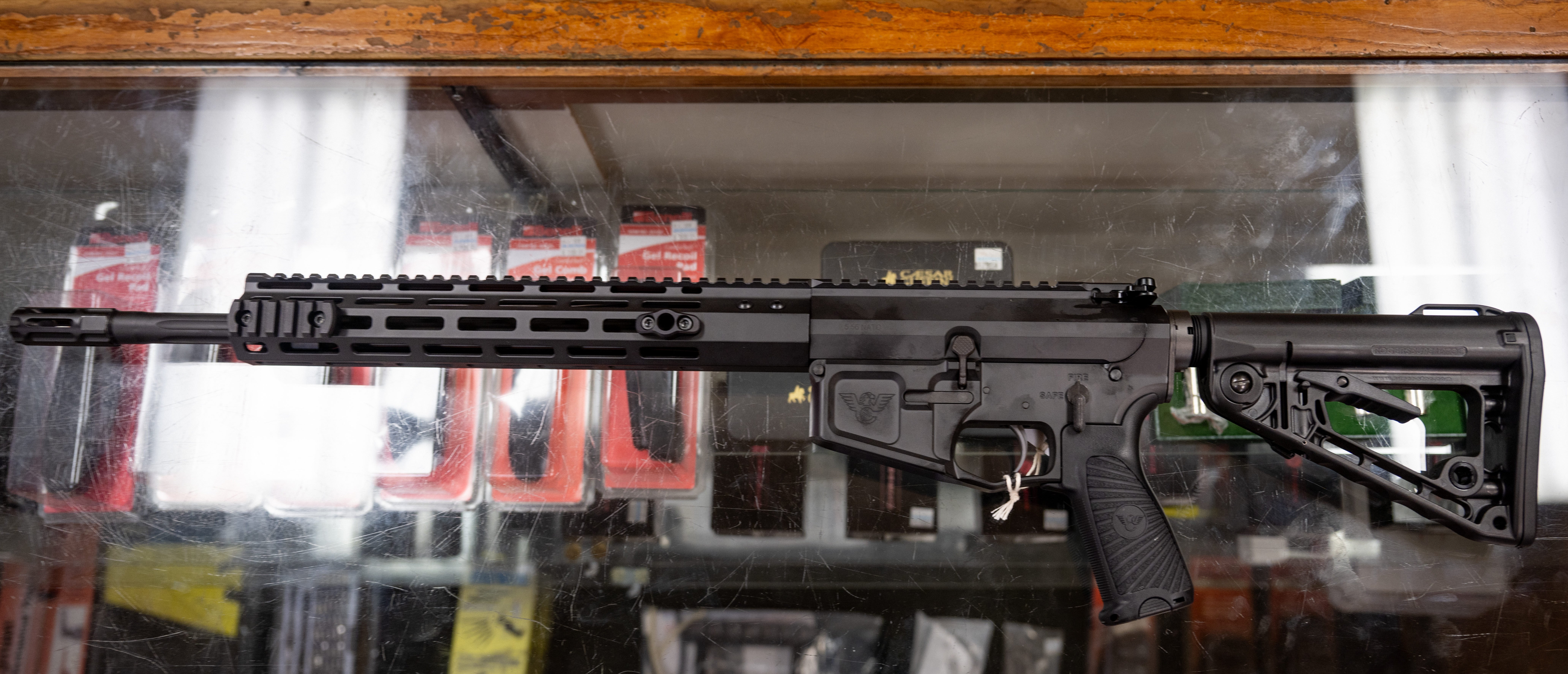 AUSTIN, TEXAS - AUGUST 25: In this photo illustration, a semi-automatic AR-15 is displayed on a countertop at the McBride Guns Inc. store on August 25, 2023 in Austin, Texas. The Biden administration plans to revoke licenses from hundreds of firearms dealers, provoking disagreements among gun-store owners and law-enforcement veterans around the country. (Photo Illustration by Brandon Bell/Getty Images)