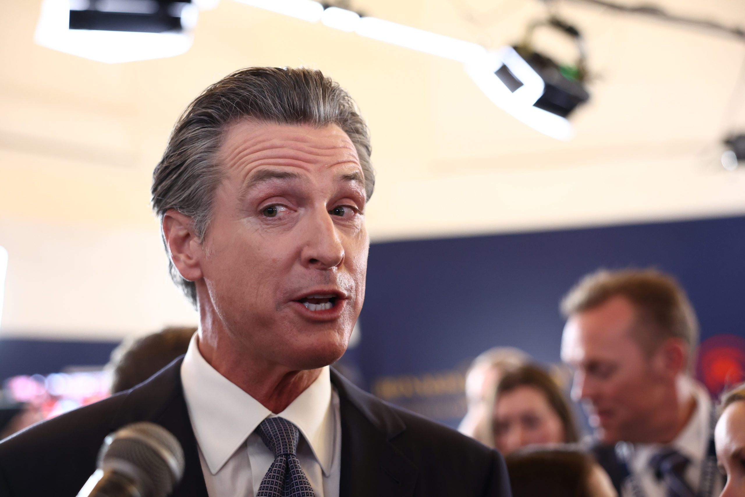 SIMI VALLEY, CALIFORNIA - SEPTEMBER 27: California Gov. Gavin Newsom talks to reporters in the spin room following the FOX Business Republican Primary Debate at the Ronald Reagan Presidential Library on September 27, 2023 in Simi Valley, California. Seven presidential hopefuls squared off in the second Republican primary debate as former U.S. President Donald Trump, currently facing indictments in four locations, declined again to participate. (Photo by Mario Tama/Getty Images)