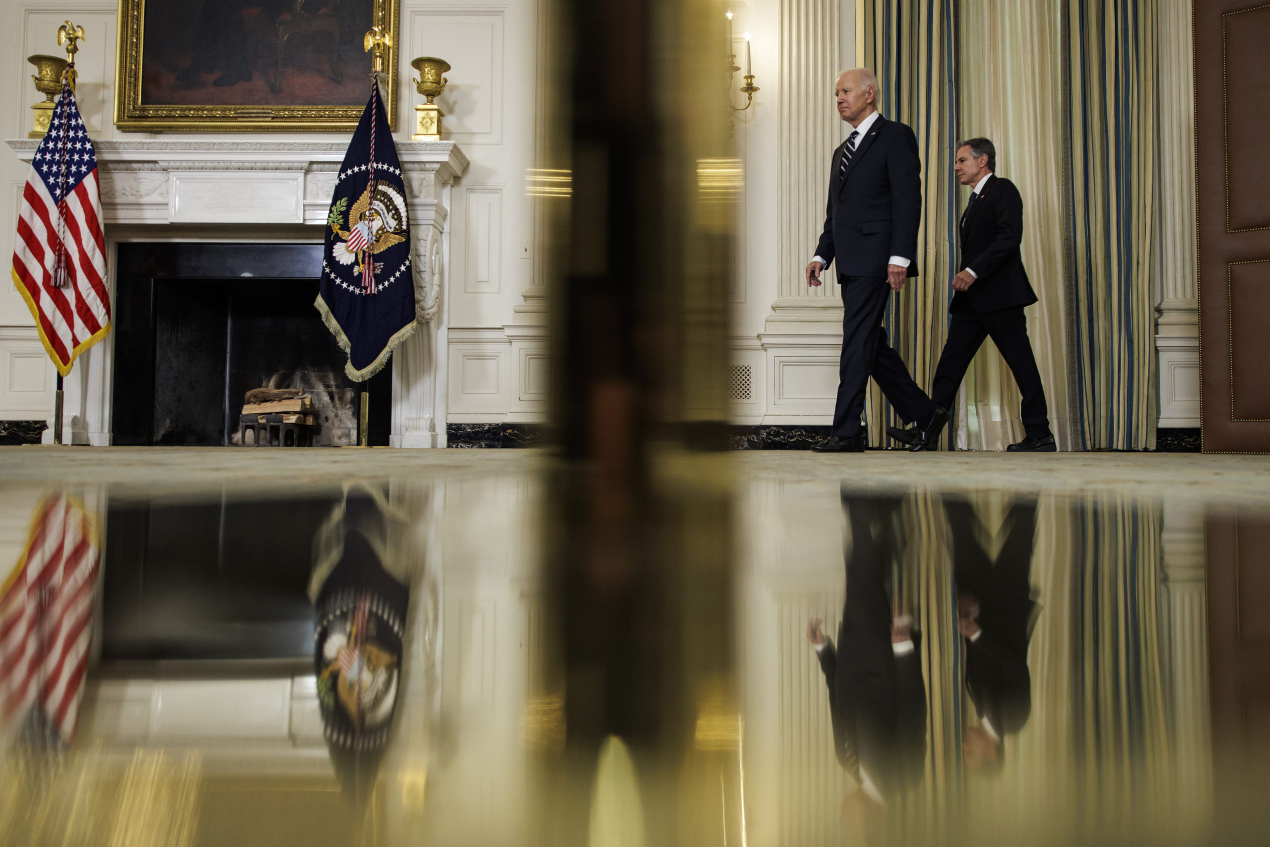 President Joe Biden and Secretary of State Antony Blinken walk into the State Dining Room to deliver remarks on the terrorist attacks in Israel at the White House on October 7, 2023 in Washington, DC. The White House has said that senior national security officials have briefed the President on the attacks on Israel that were carried out by Hamas overnight and White House officials remain in close contact with their counterparts in Israel. (Photo by Samuel Corum/Getty Images)