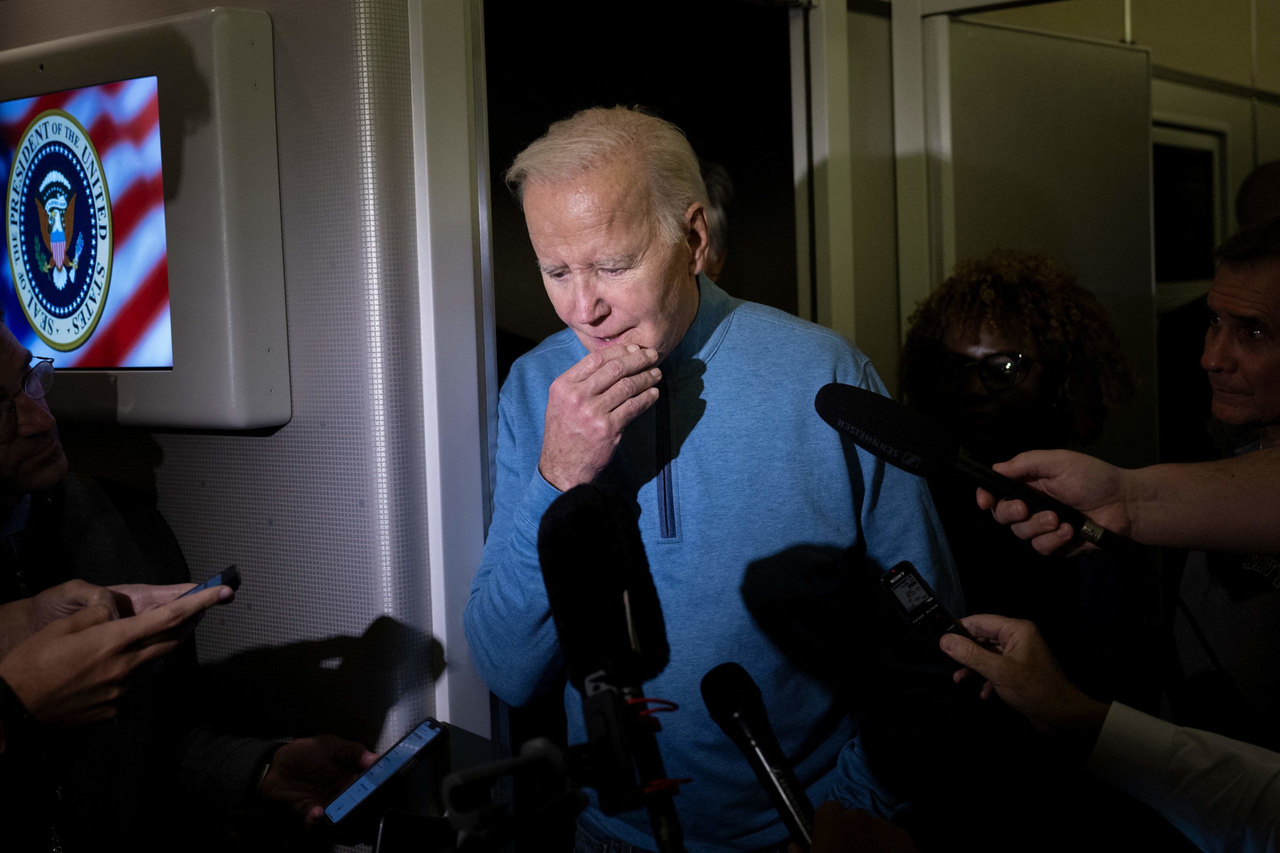 US President Joe Biden speaks to the press aboard Air Force One during a refueling stop at Ramstein Air Base on October 18, 2023 as he returns from a visit to Israel. (Photo by Brendan Smialowski / AFP) (Photo by BRENDAN SMIALOWSKI/AFP via Getty Images)
