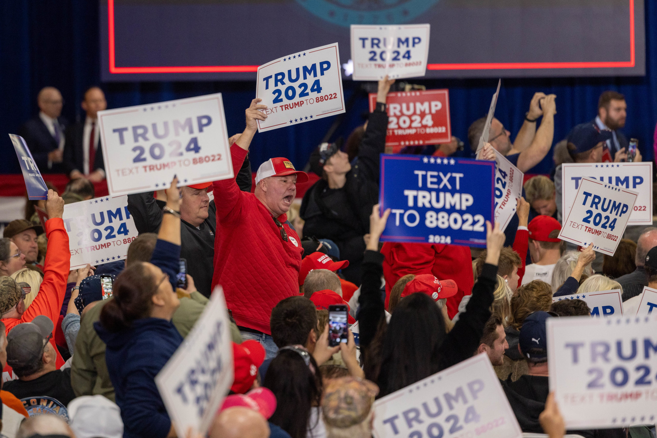 Supporters of Republican presidential candidate former President Donald Trump cheer before an event on October 23, 2023 in Derry, New Hampshire. Trump officially filed for the first-in-the-nation primary on Monday at the New Hampshire State House. (Photo by Scott Eisen/Getty Images)